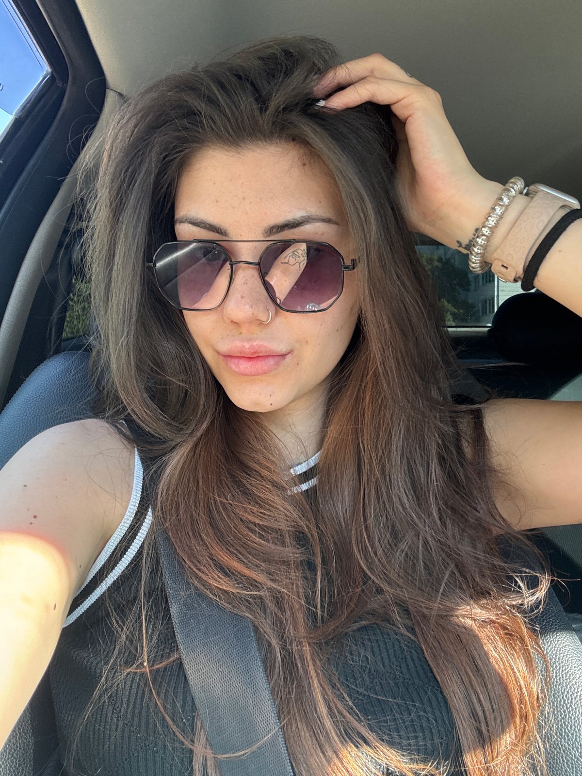 Woman photographed in passenger seat of car in Sofia