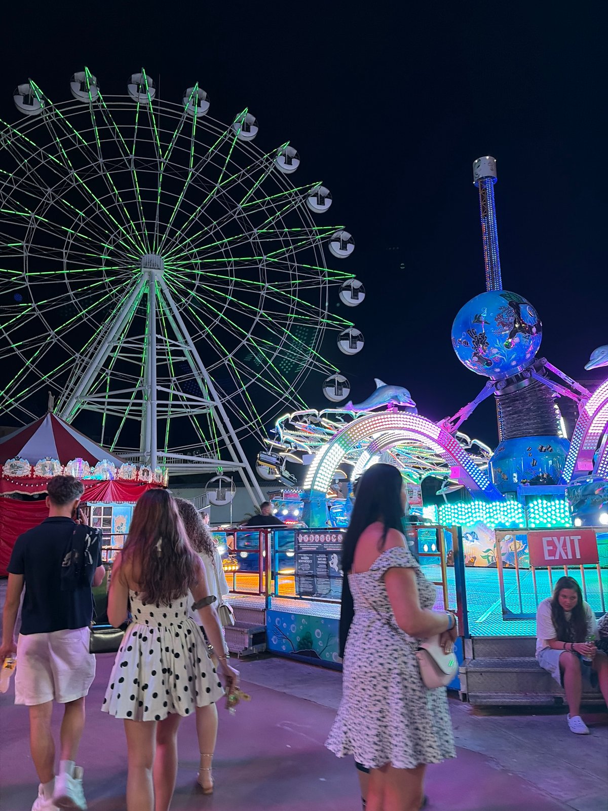 Nesebar amusement park lit up on a summer night
