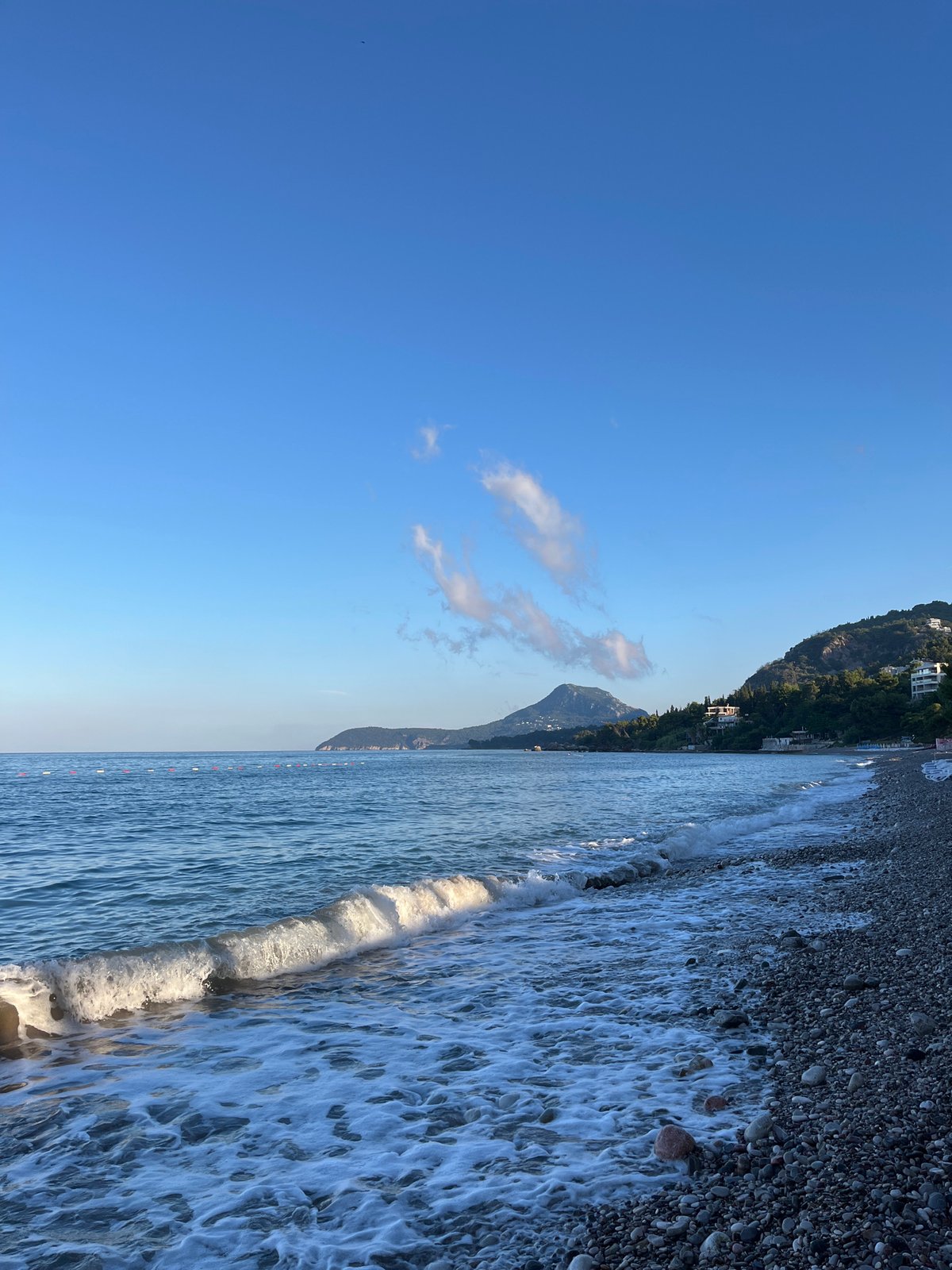 Morning coffee on the pebble shores of Bar, Montenegro