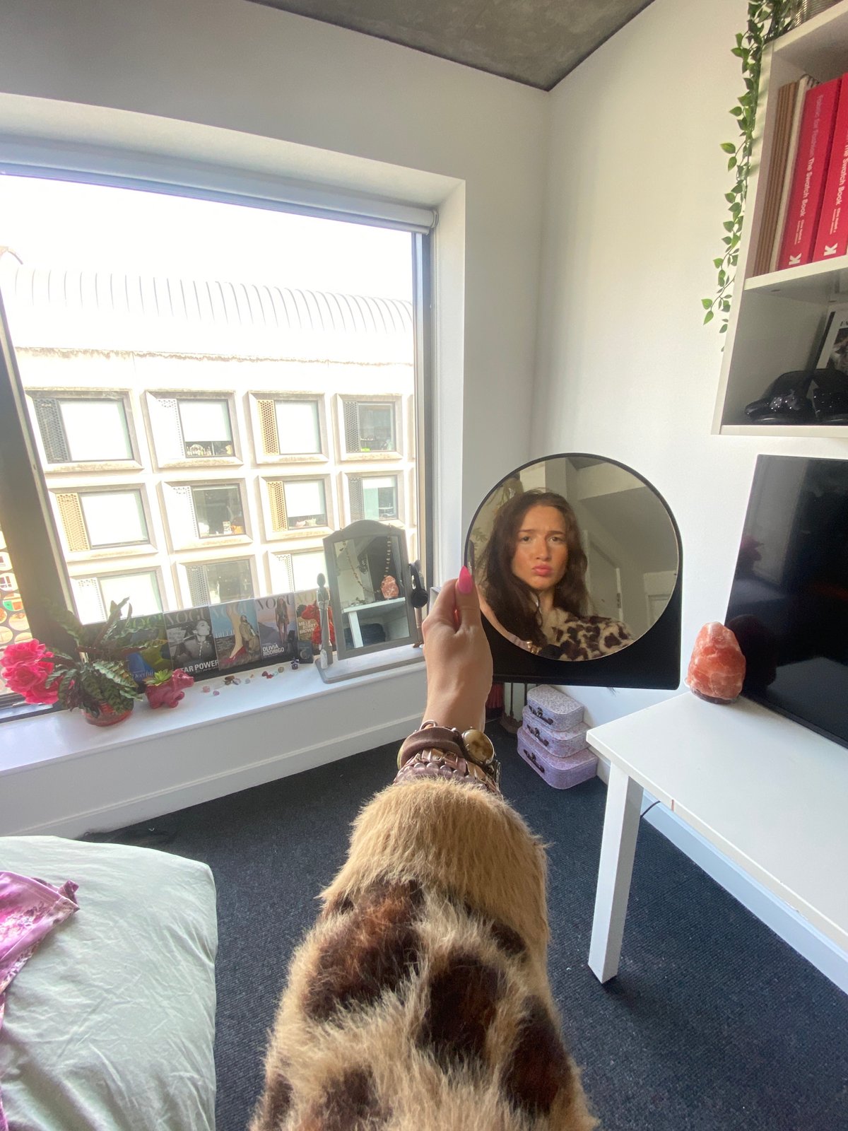 Mirror selfie series in a London building, leopard print fit