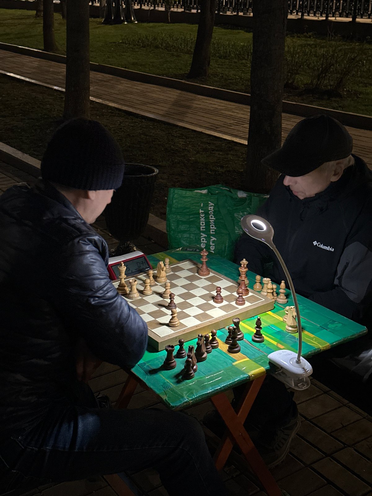 Nighttime chess game near Moscow's Danilov Monastery
