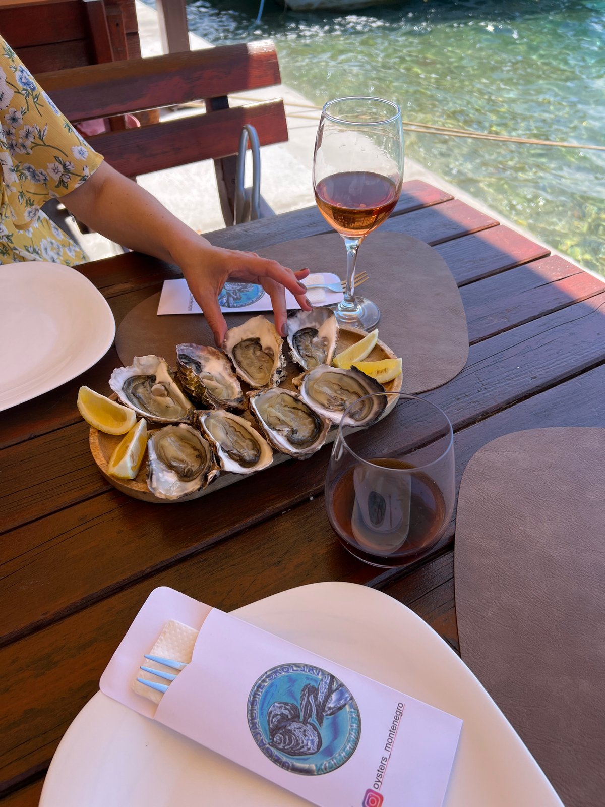 Waterside seafood dining documented in Jošice, Montenegro