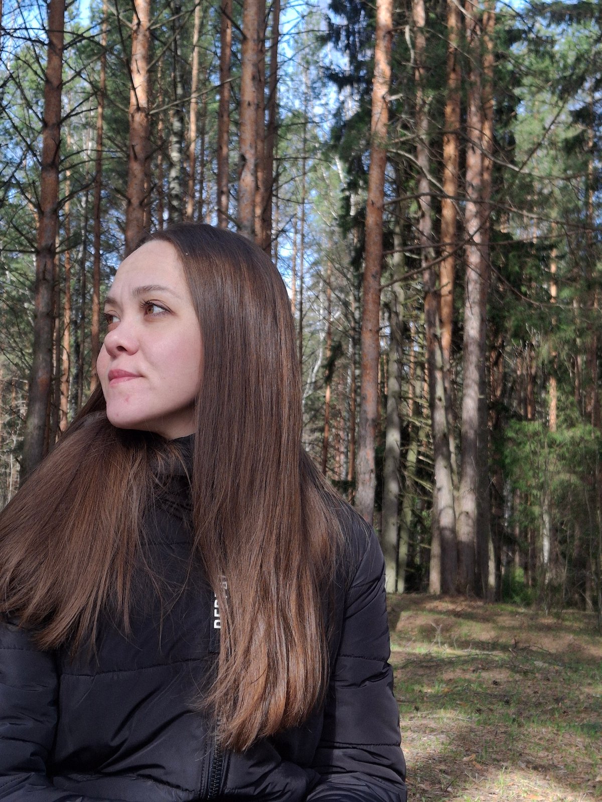 Woman photographed in pine forest near Chaikovsky, Russia