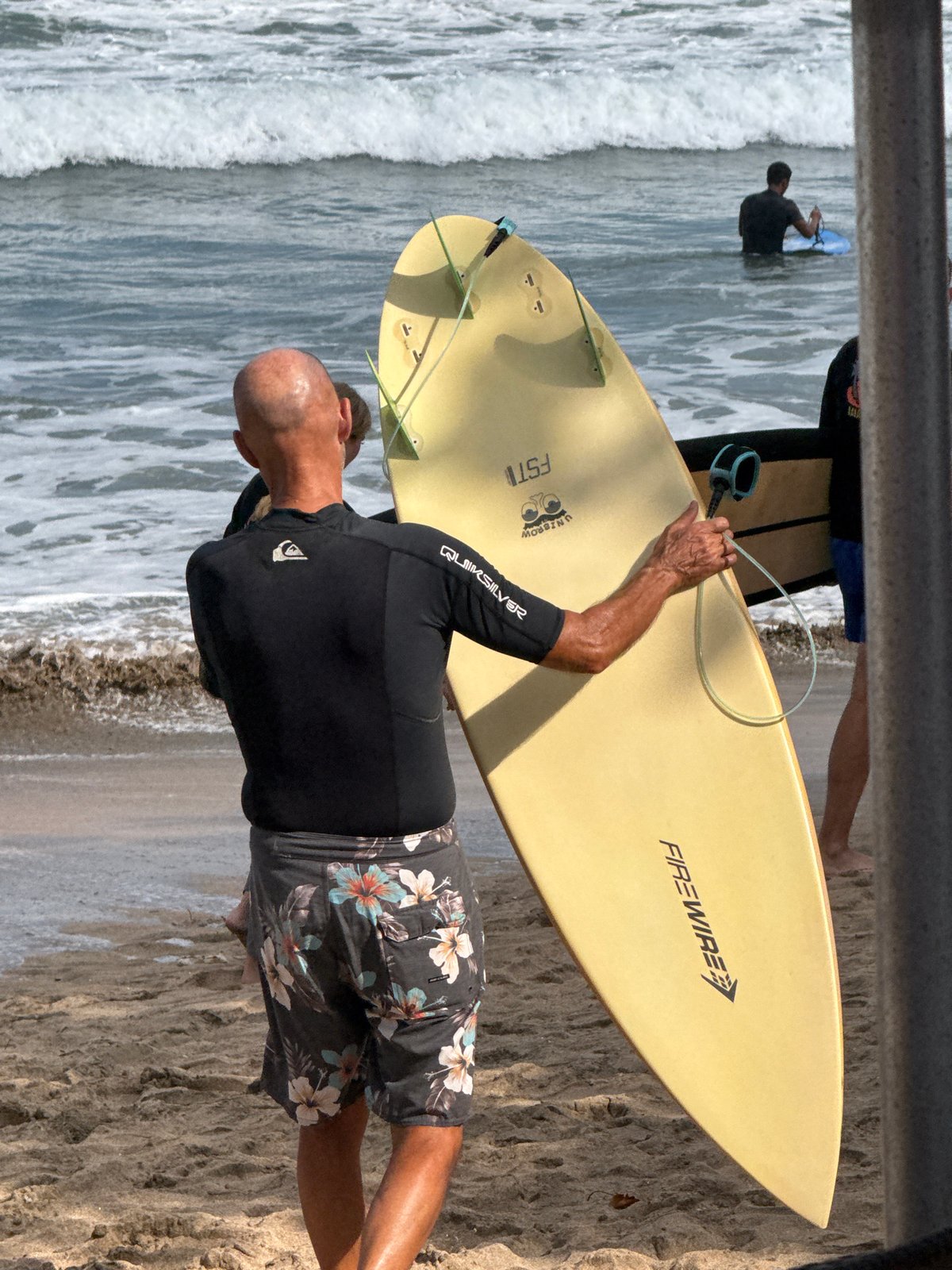 Surf session in full swing at Kuta Beach, Bali