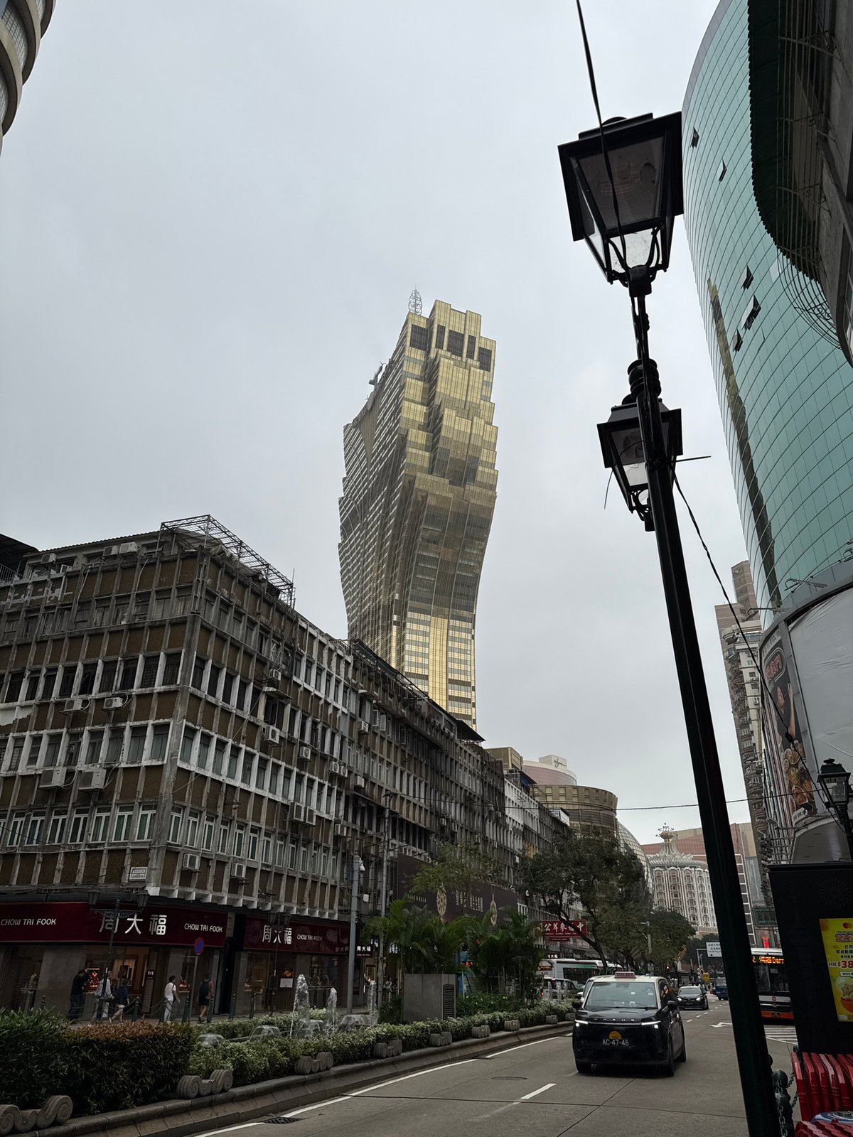 Morning taxi traffic observed on Macau street