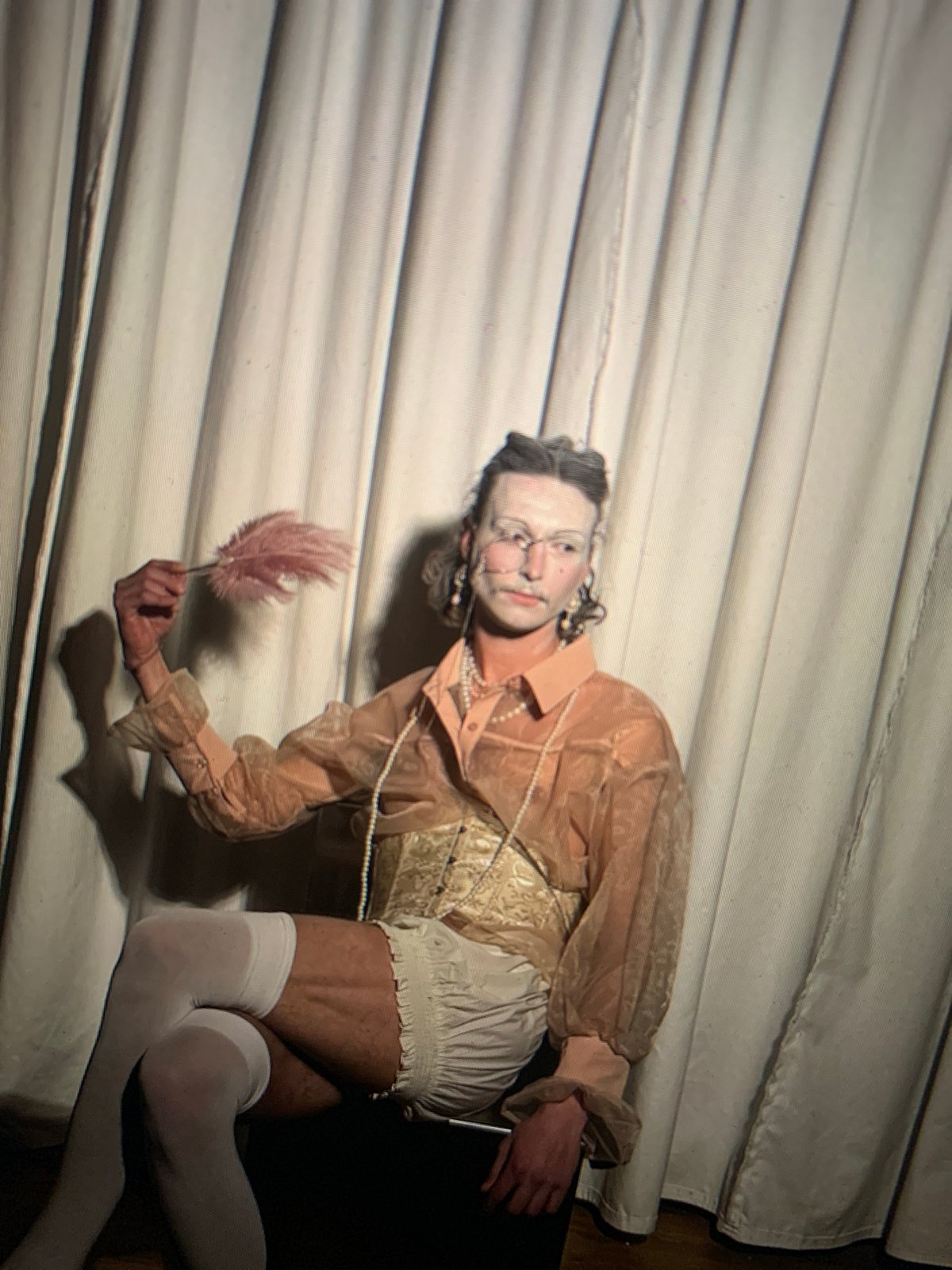 Tel Aviv indoor scenes show costumes, fashion, social moments