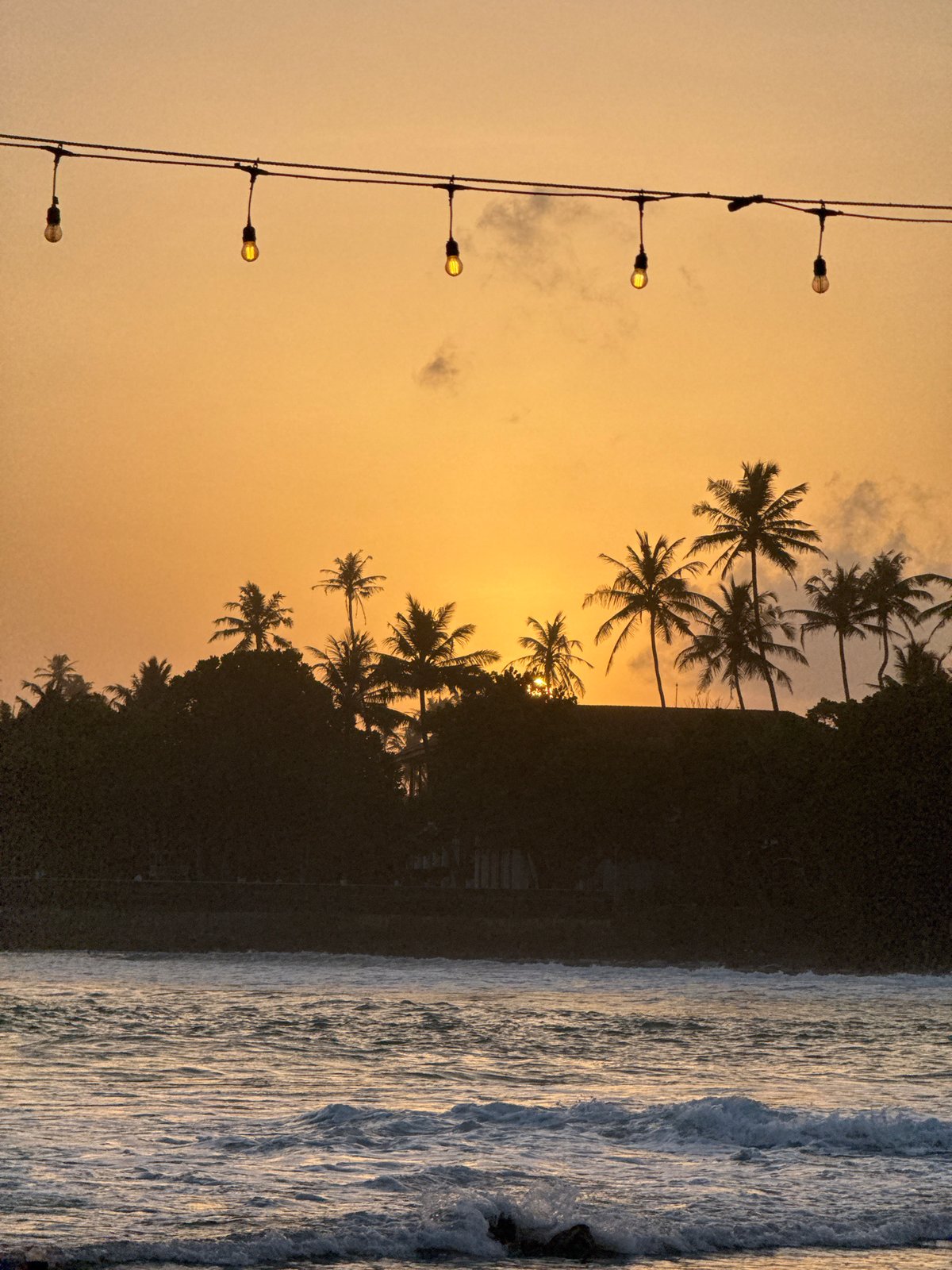 Drinks and sunset at a laid-back beach spot in Goviyapana