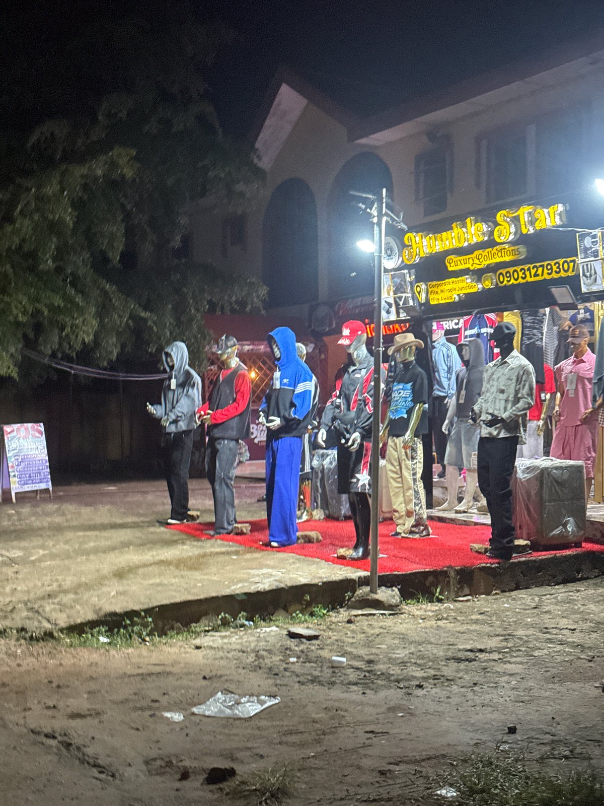 Evening stroll through illuminated Awka streets and storefronts