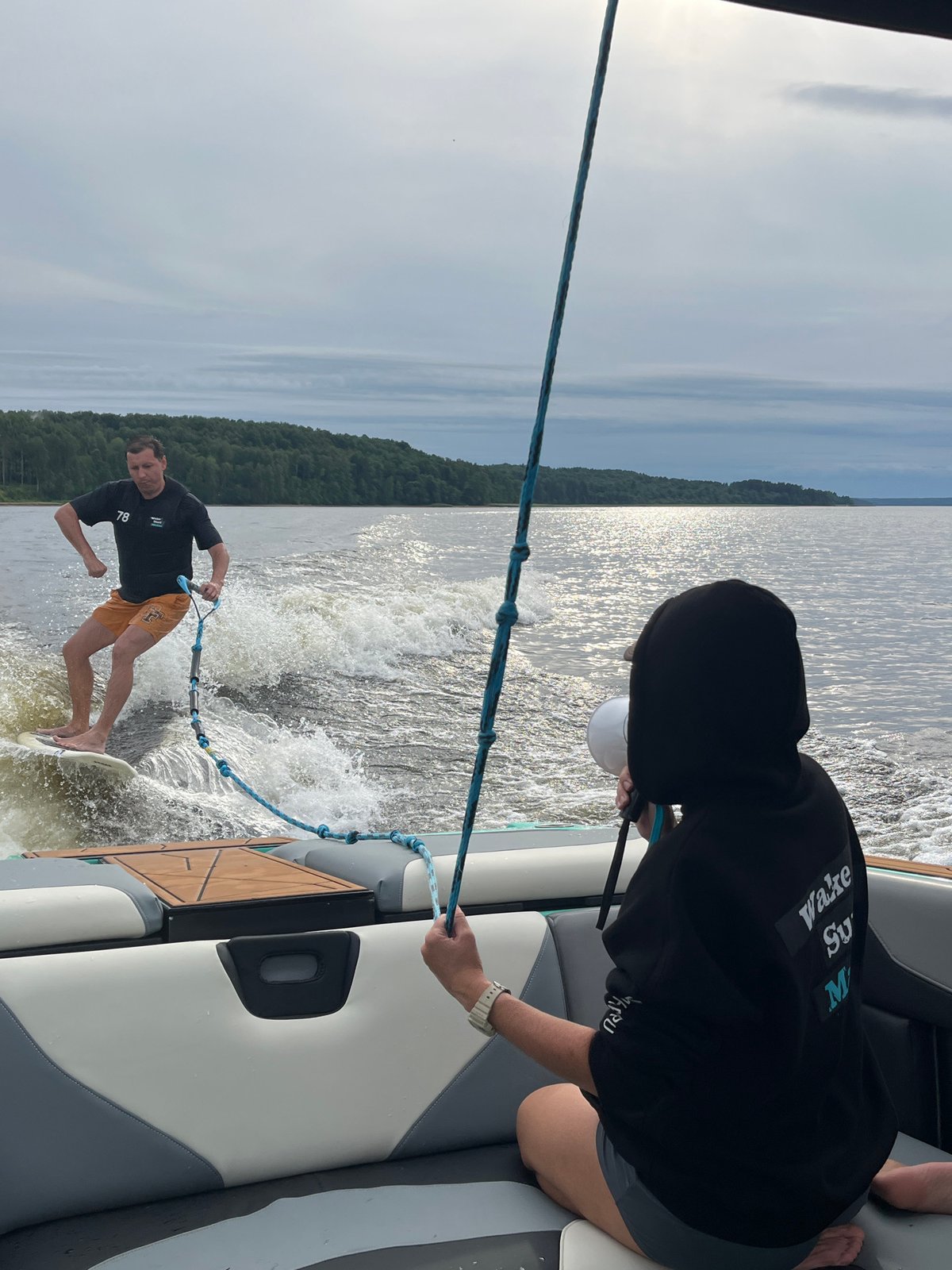 Wakeboarding session on a Gromovo lake with boat crew coaching