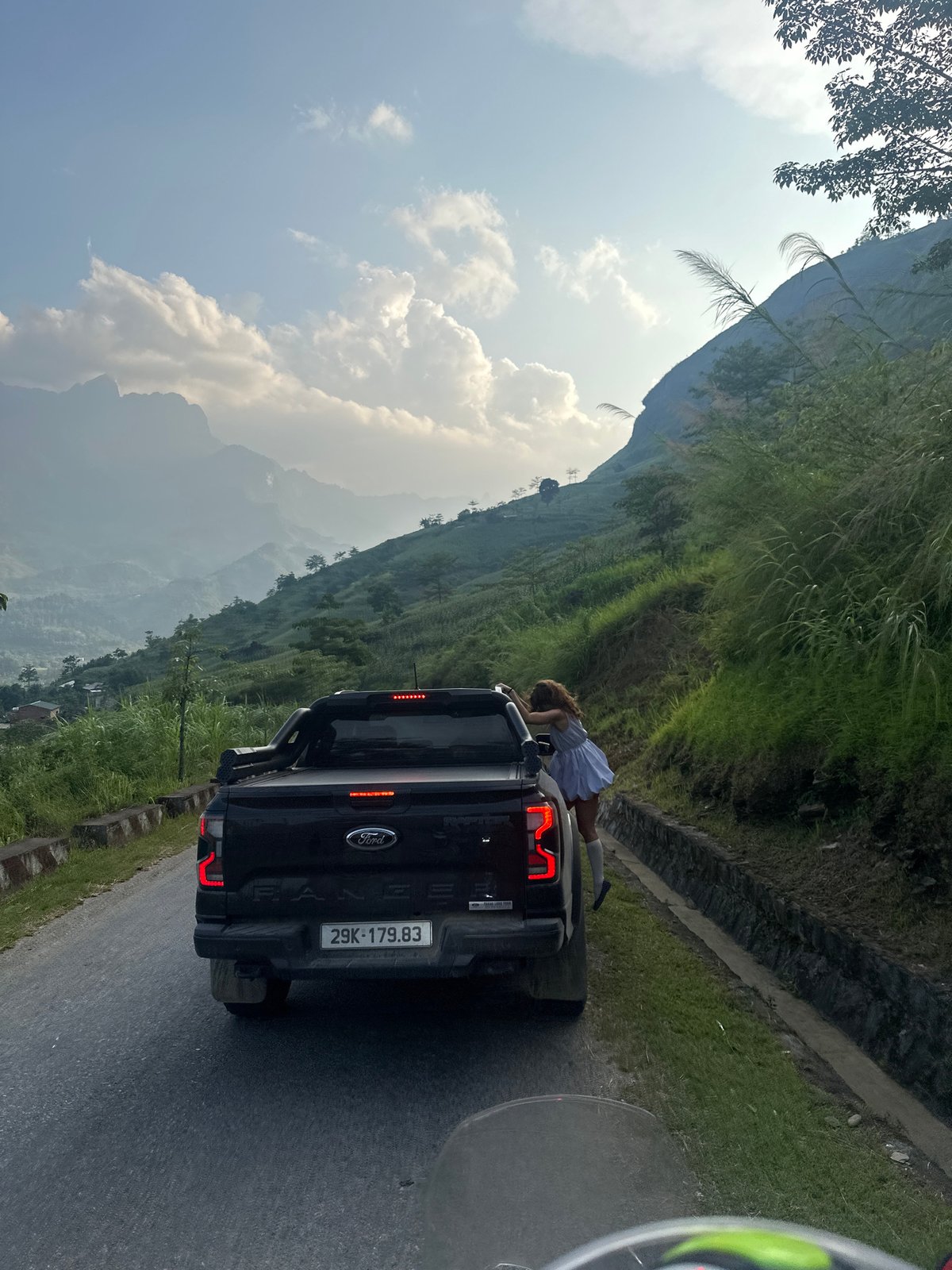 Road trip group documents scenic stop in Vietnamese mountains