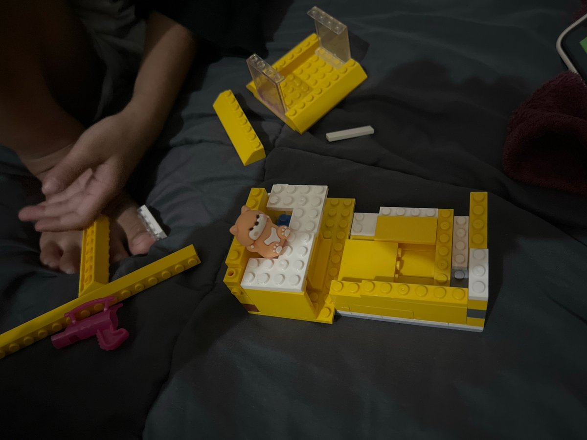 Children spend afternoon playing Lego and mobile games indoors