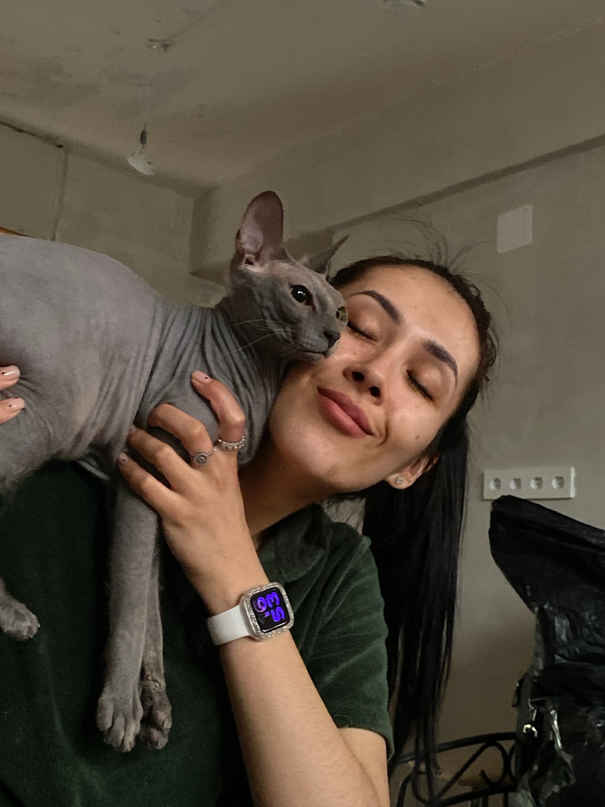 Woman photographed with Sphynx cat in intimate moments, Votkinsk