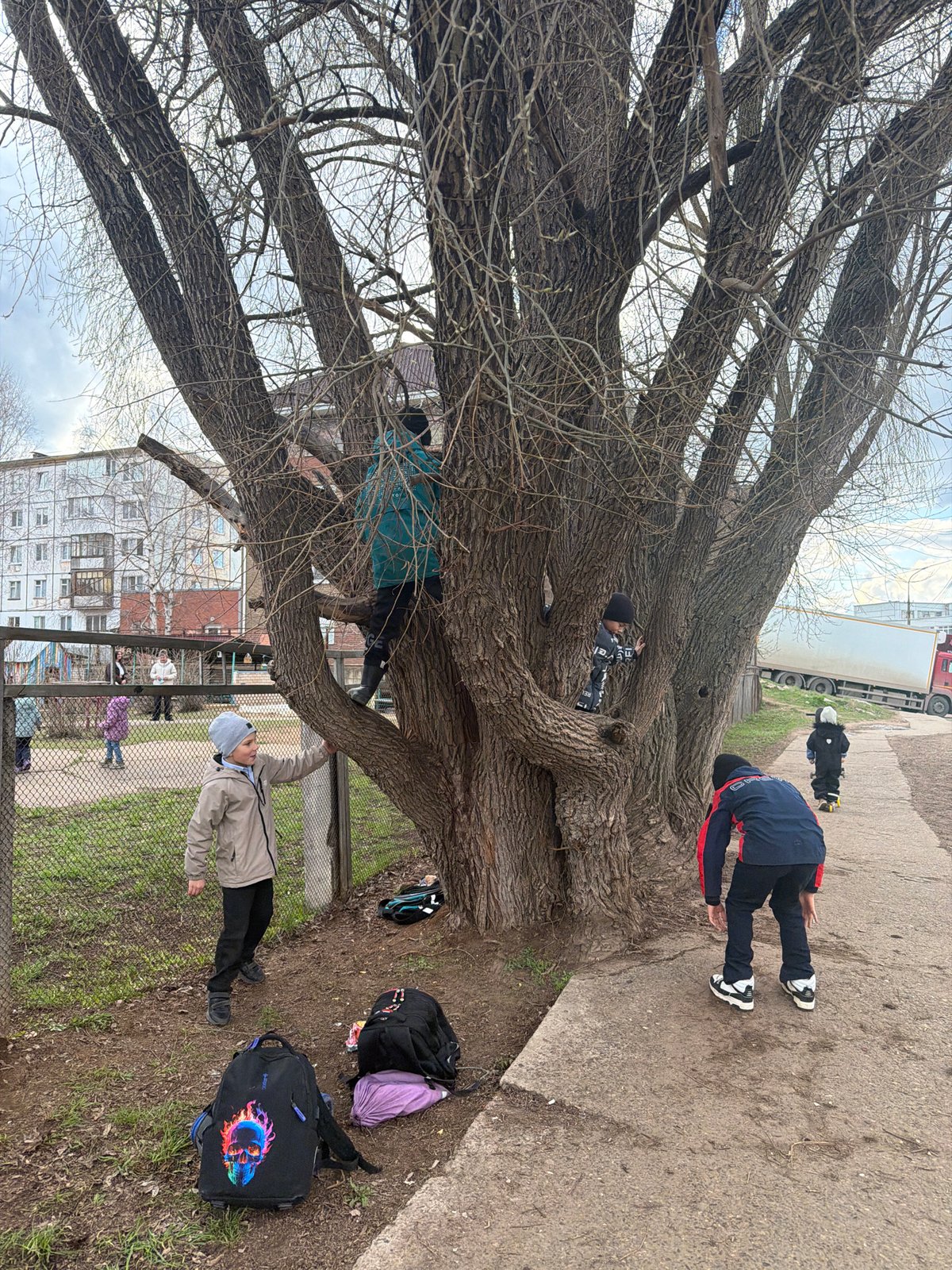 Children and youth captured in everyday Chaikovsky street scenes
