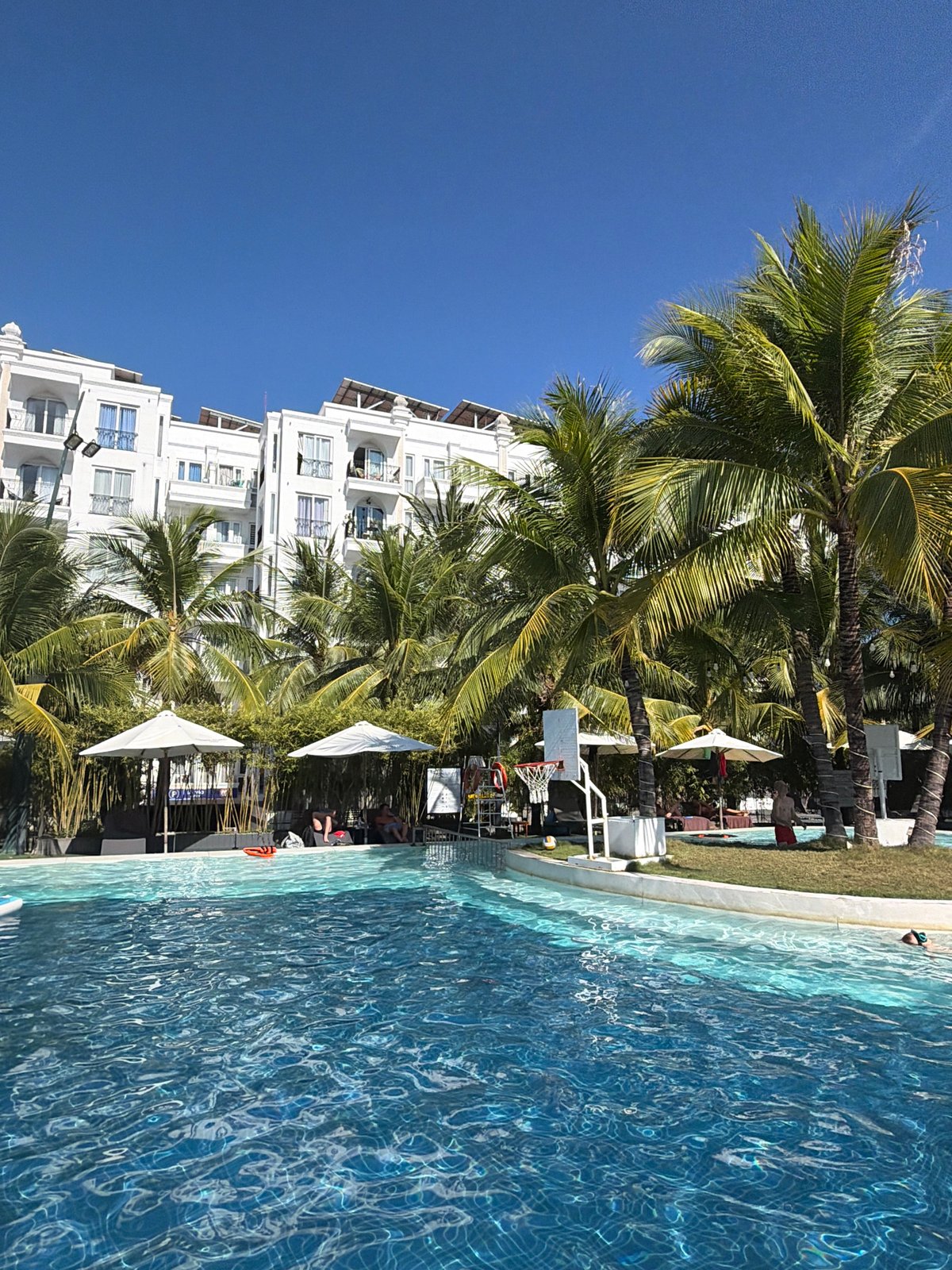 Sunny morning at a Nha Trang resort pool