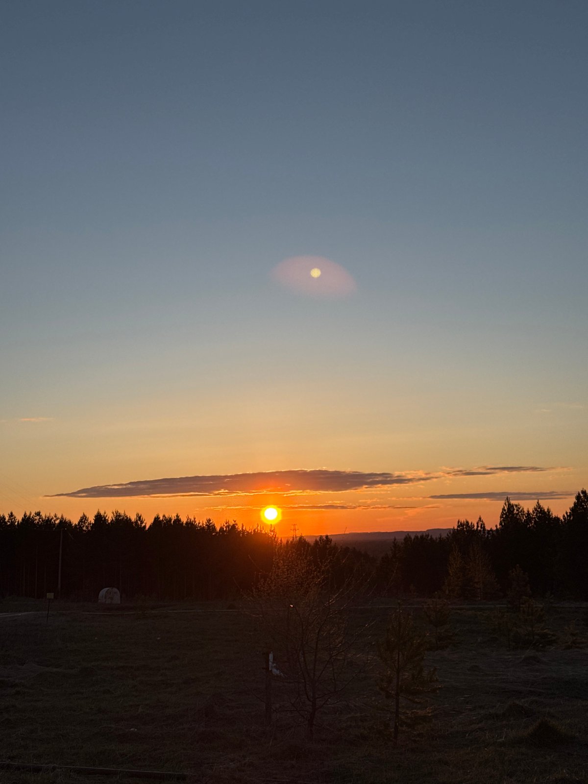 Sunset observed in Chaikovsky, Russia with distinctive cloud formation