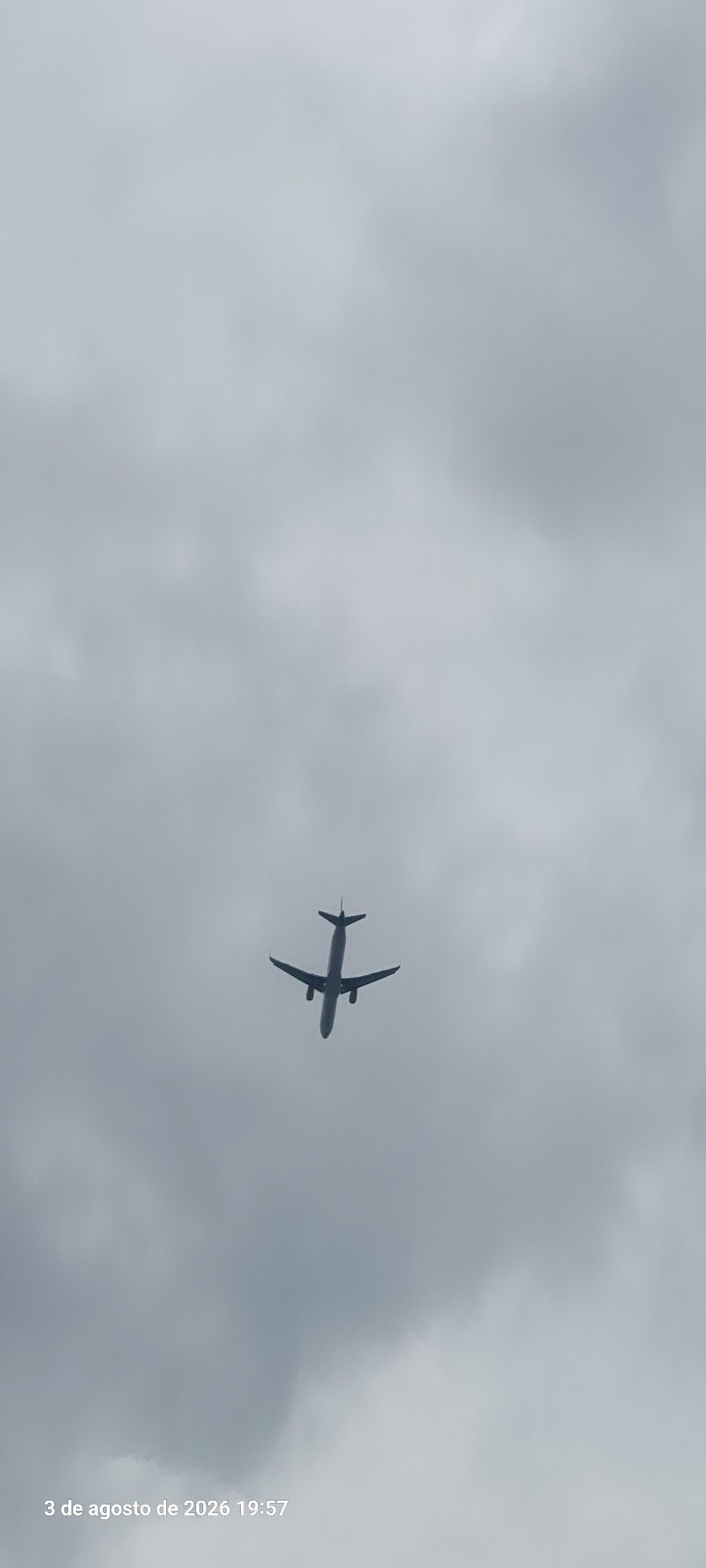 Cloudy summer afternoon at Castelldefels beach, planes overhead