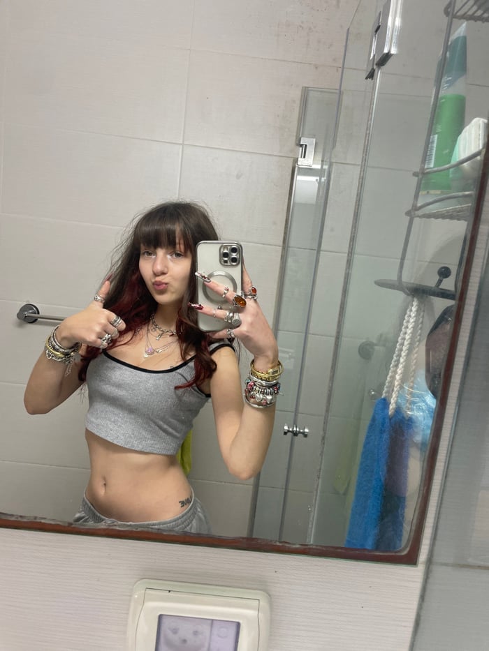 Woman documents evening takeout meal with selfies in Ra'anana