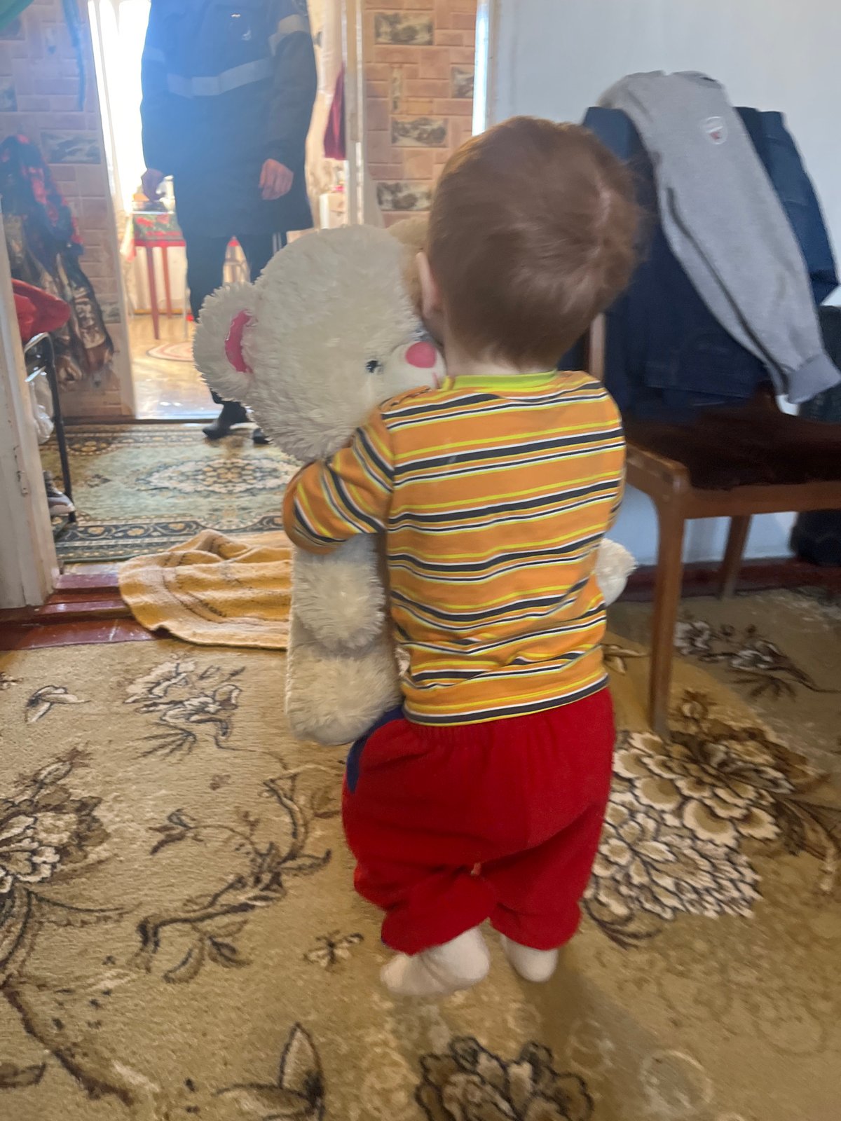 Quiet family moments captured in rural Russian village morning