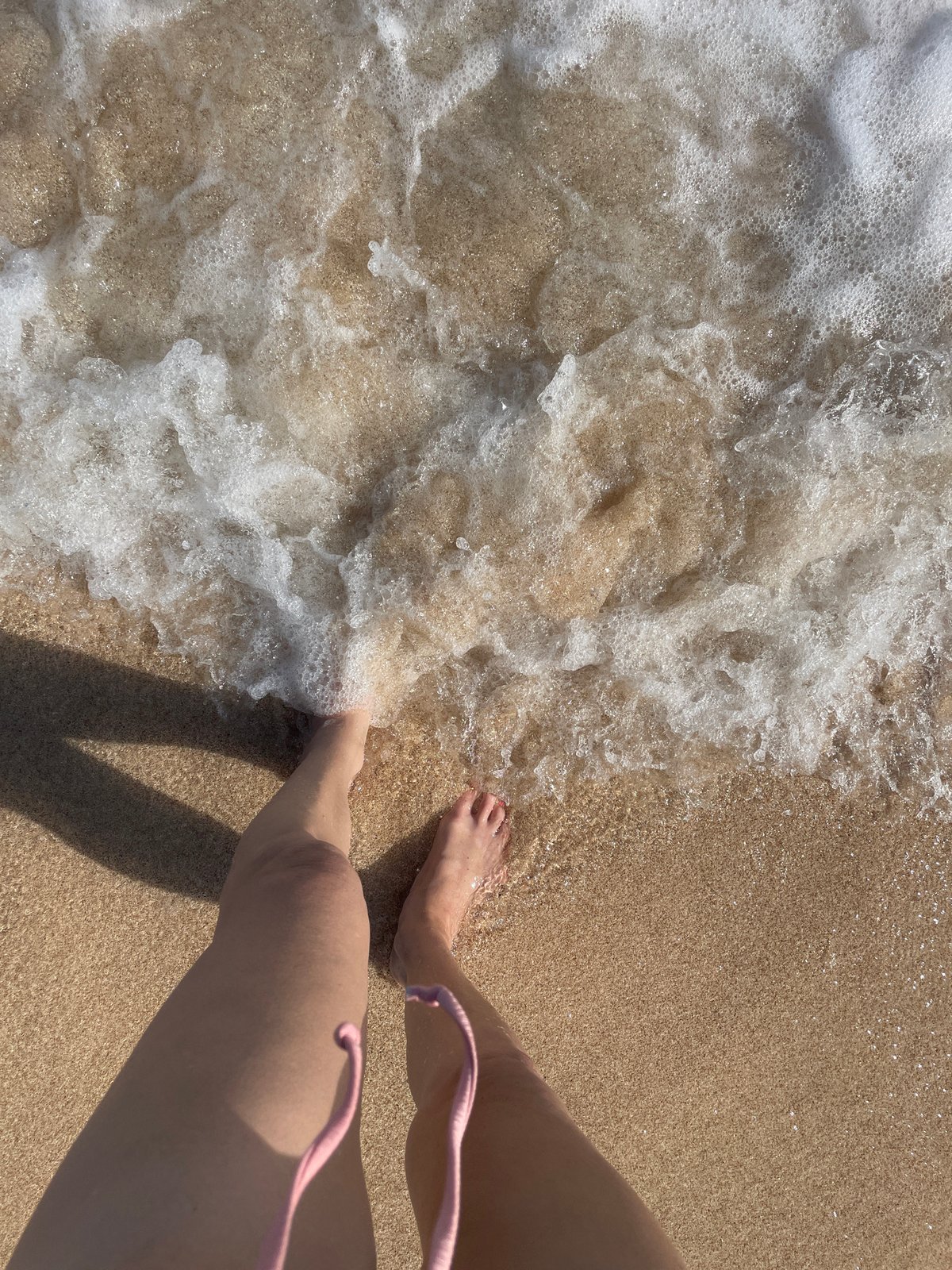 Morning in the Bali surf, wading and swimming at Kuta Selatan
