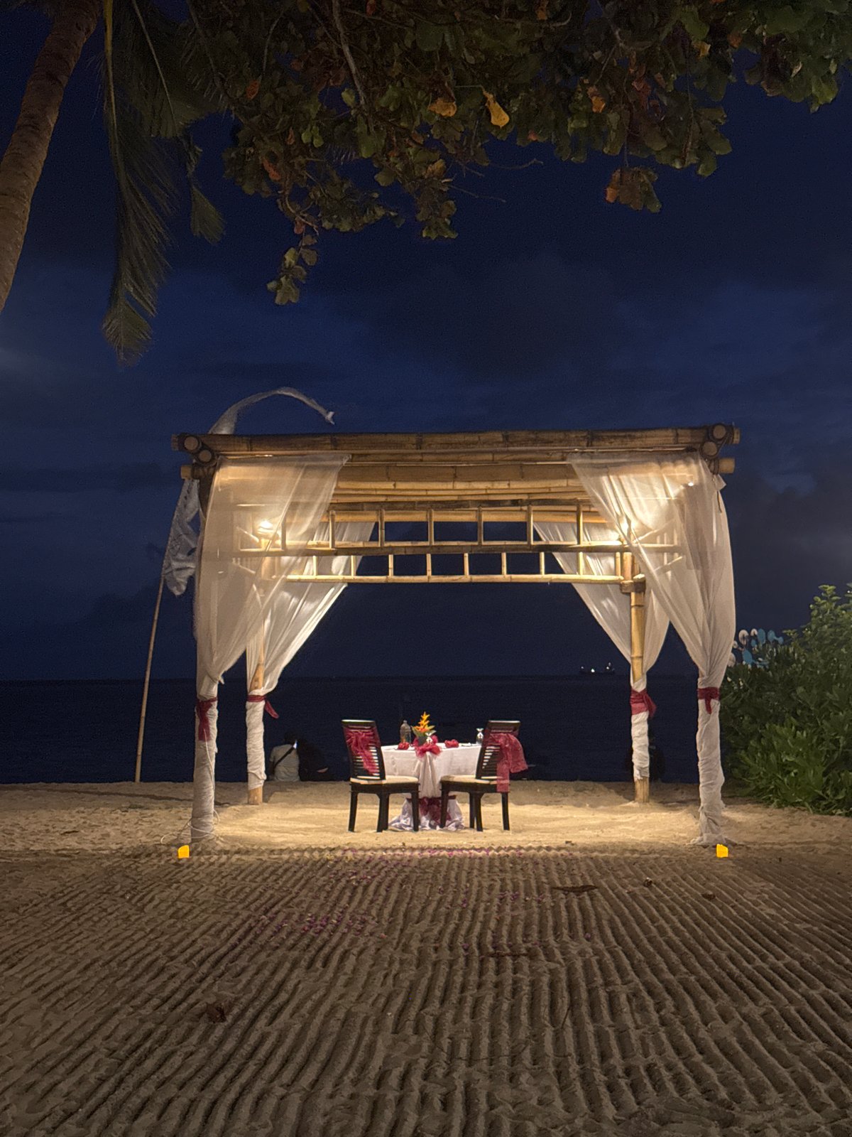 Evening beach gatherings and romantic dinner setup in Denpasar