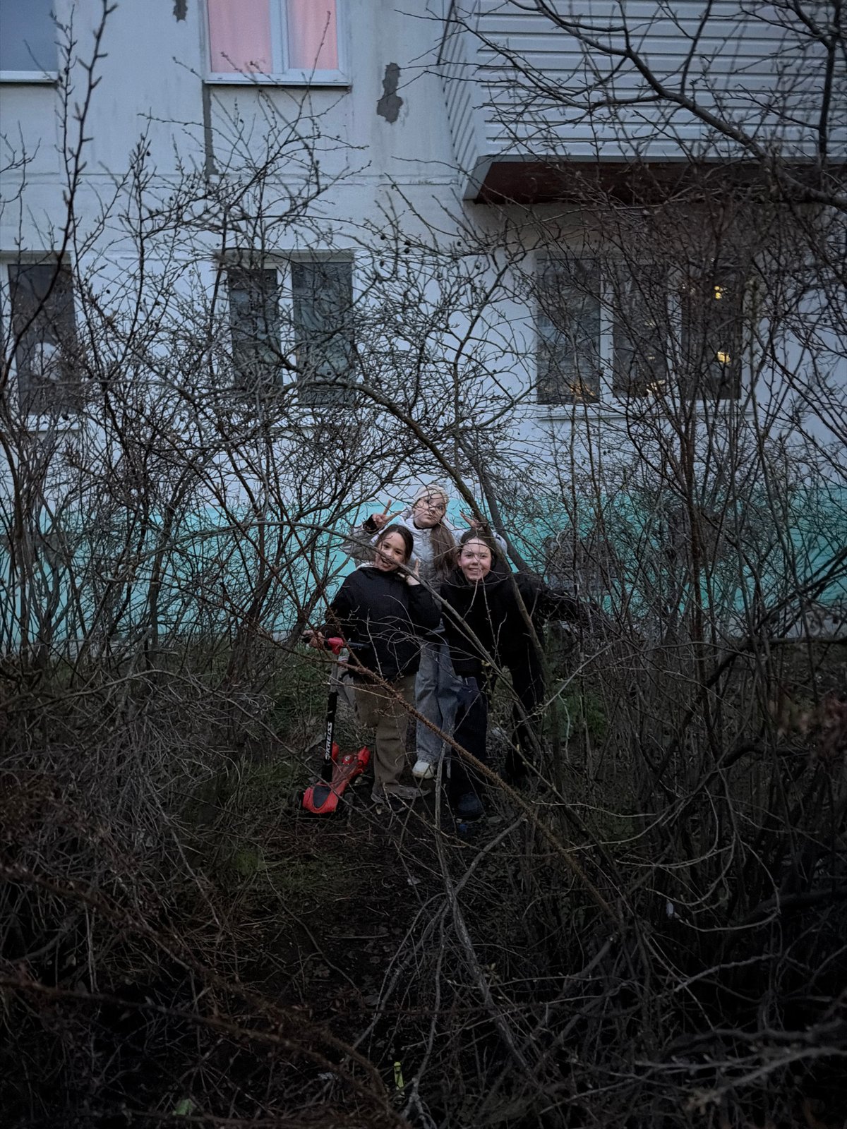 Children photographed in neglected urban spaces in Chaikovsky, Russia