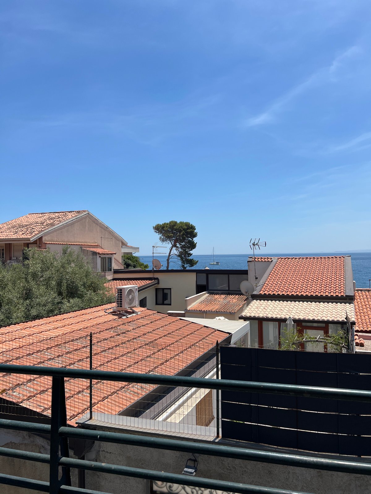 Catania's Ionian coastline on a sunny June morning