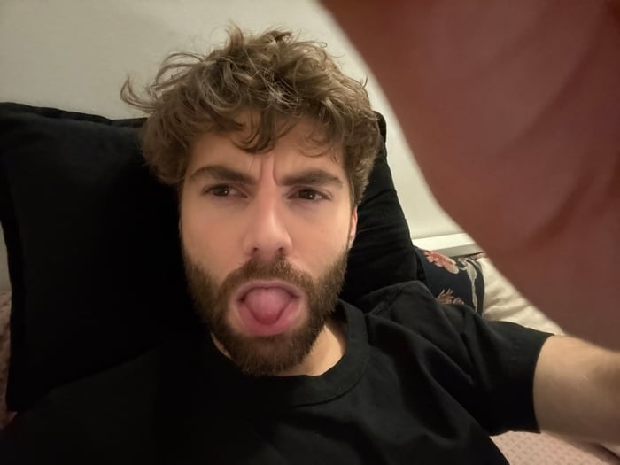 Casual selfies captured during evening hangout in Paris apartment