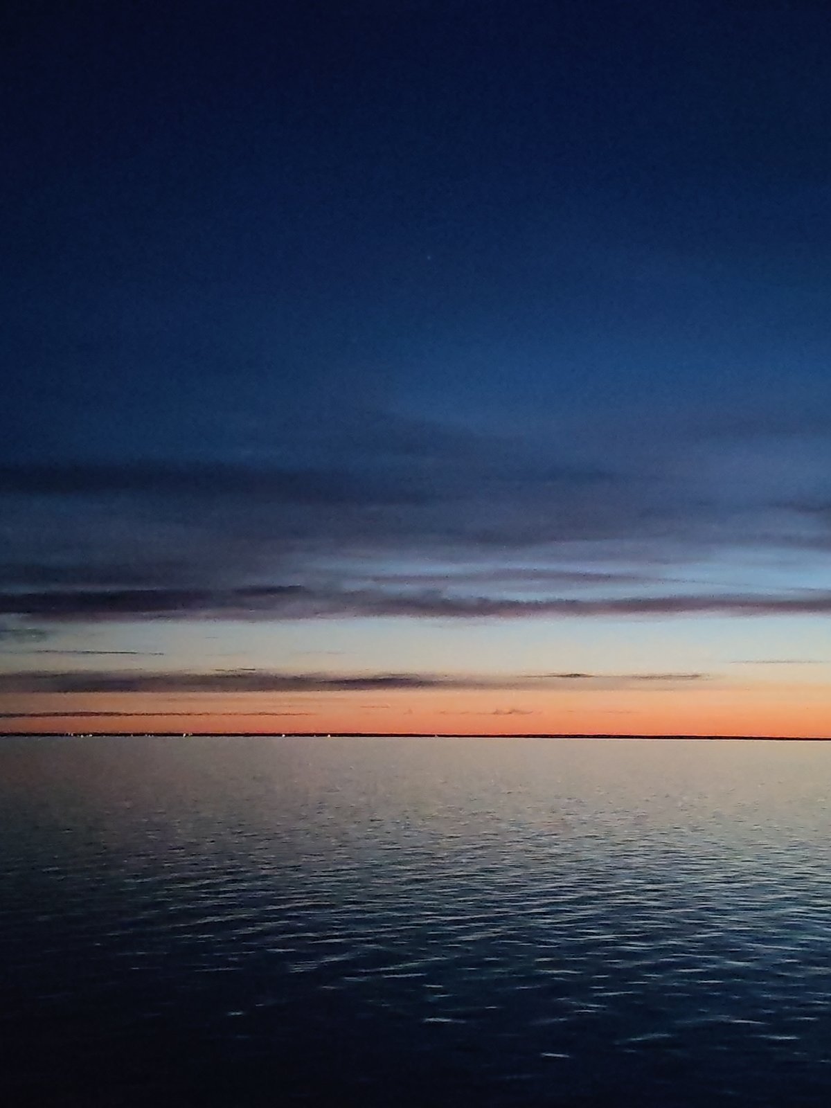 Sunset observed over Lake Beloye near Belozersk, Russia