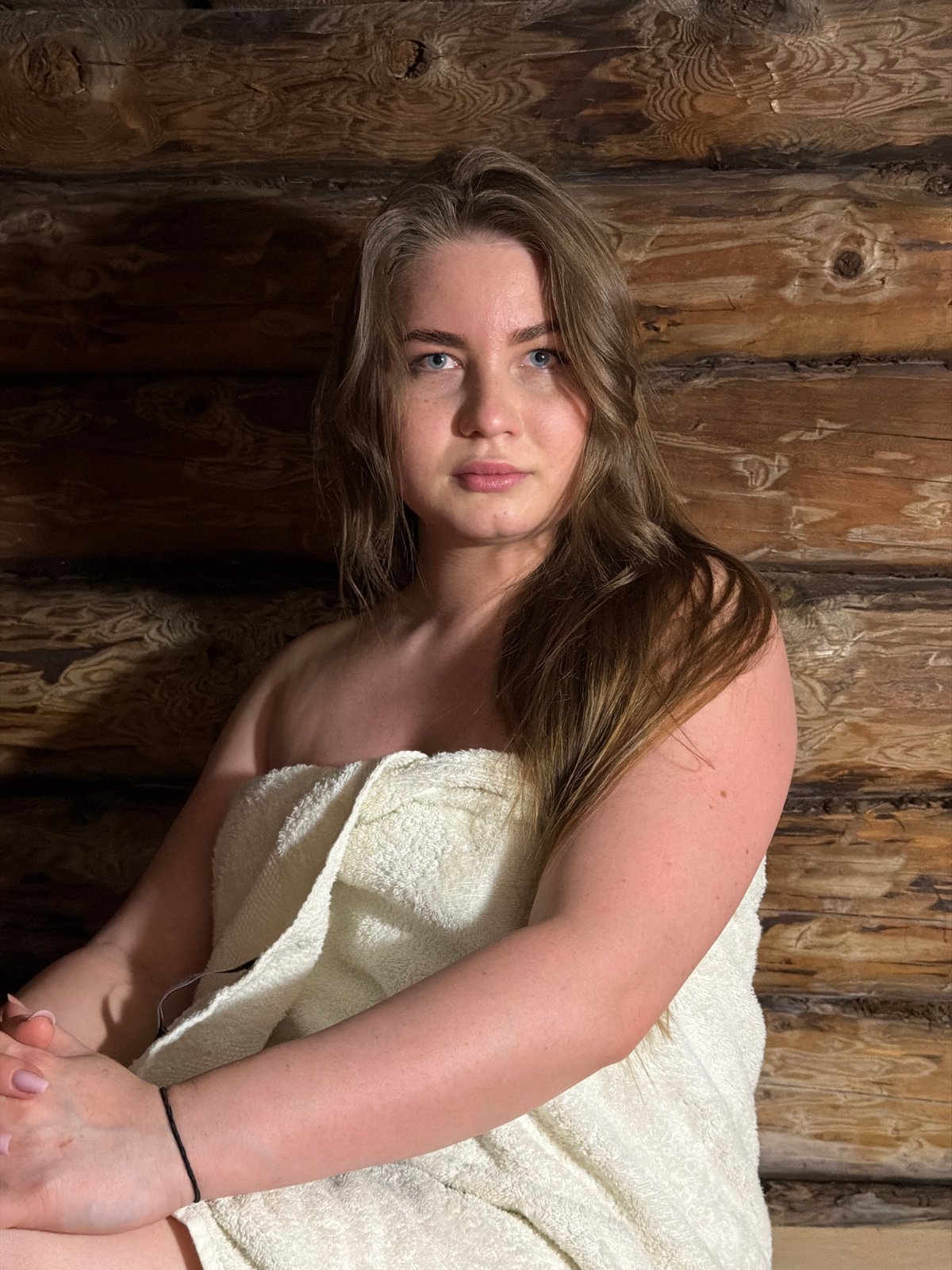 Woman photographed multiple times in rural Russian setting