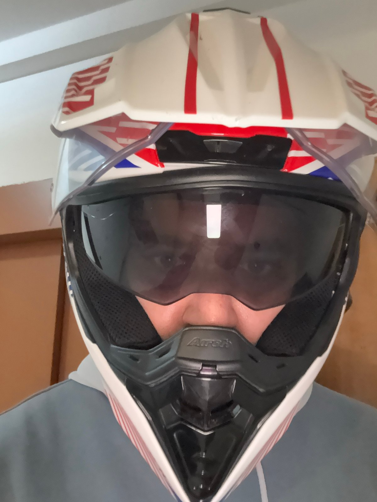 Motorcyclist spotted wearing white-red helmet in Tangier