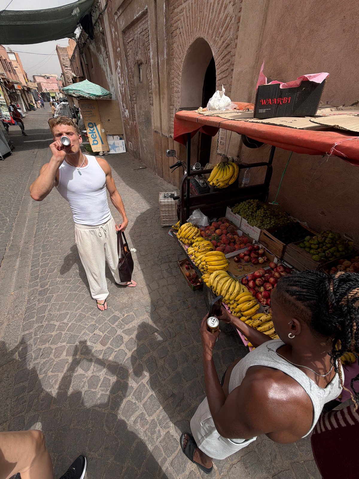 Taking a drink amid the bustle of a Marrakesh marketplace