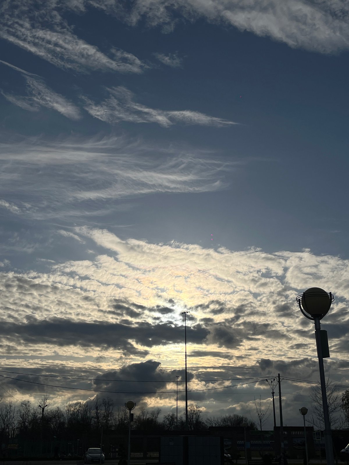 Woman documents afternoon with selfies, sky watching in Novopokrovskaya