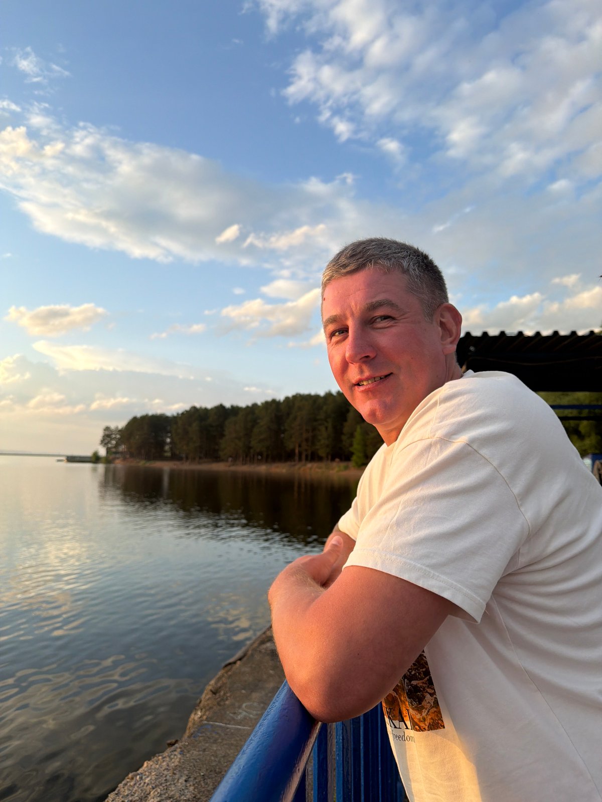 Families gather for sunset moments along Chaikovsky waterfront