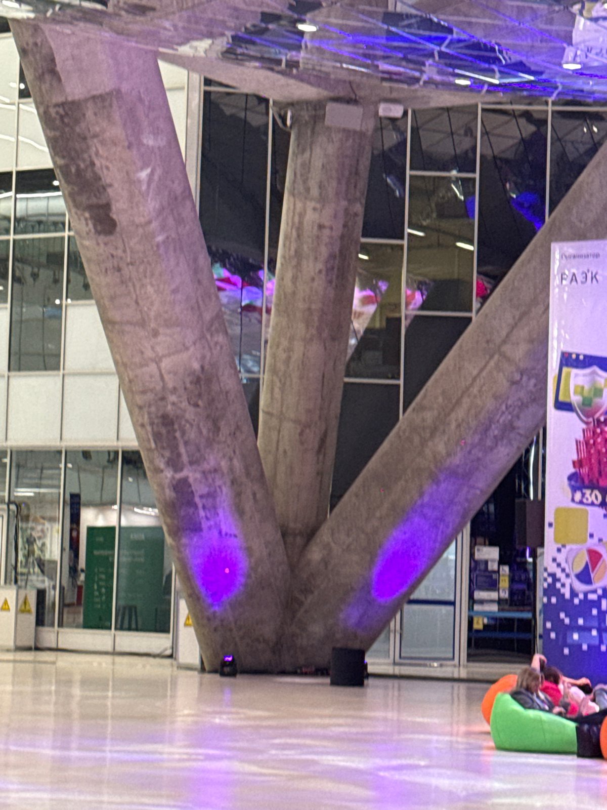 Conference event documented at modern Moscow venue with dining, presentations
