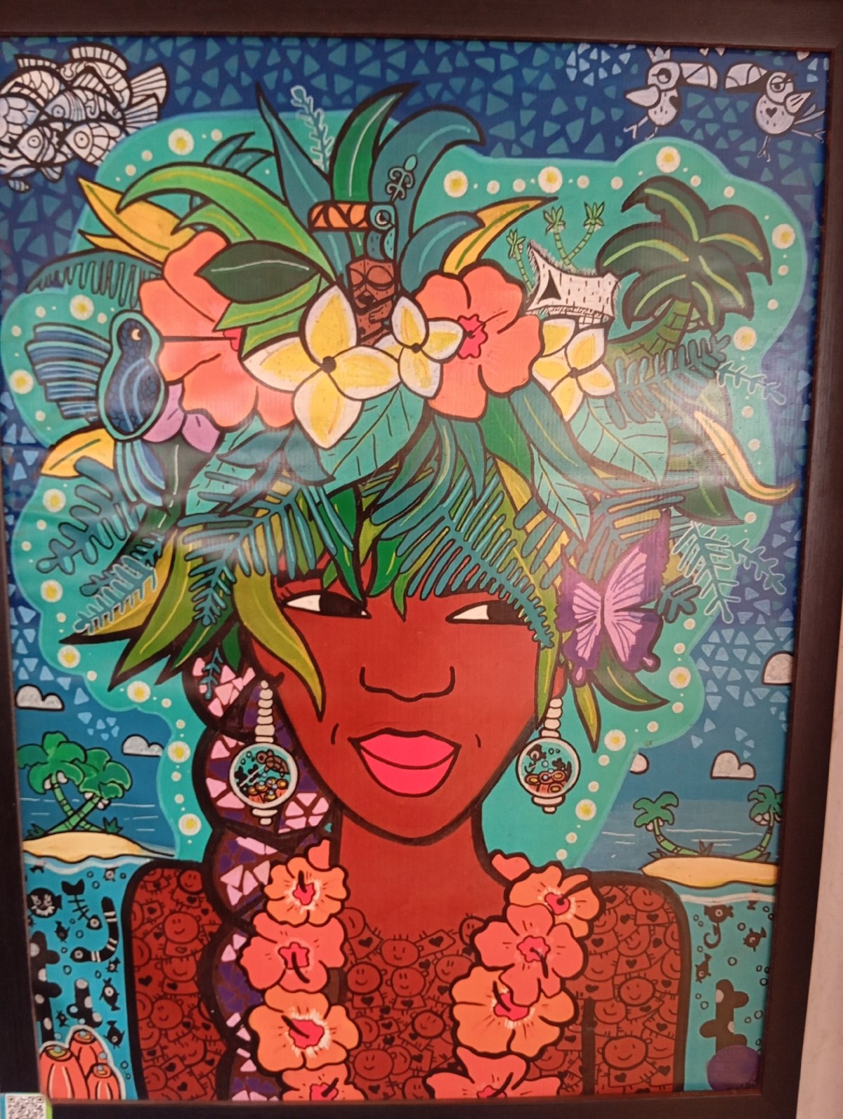 Folk art gallery displays vibrant portraits in Arambol, India