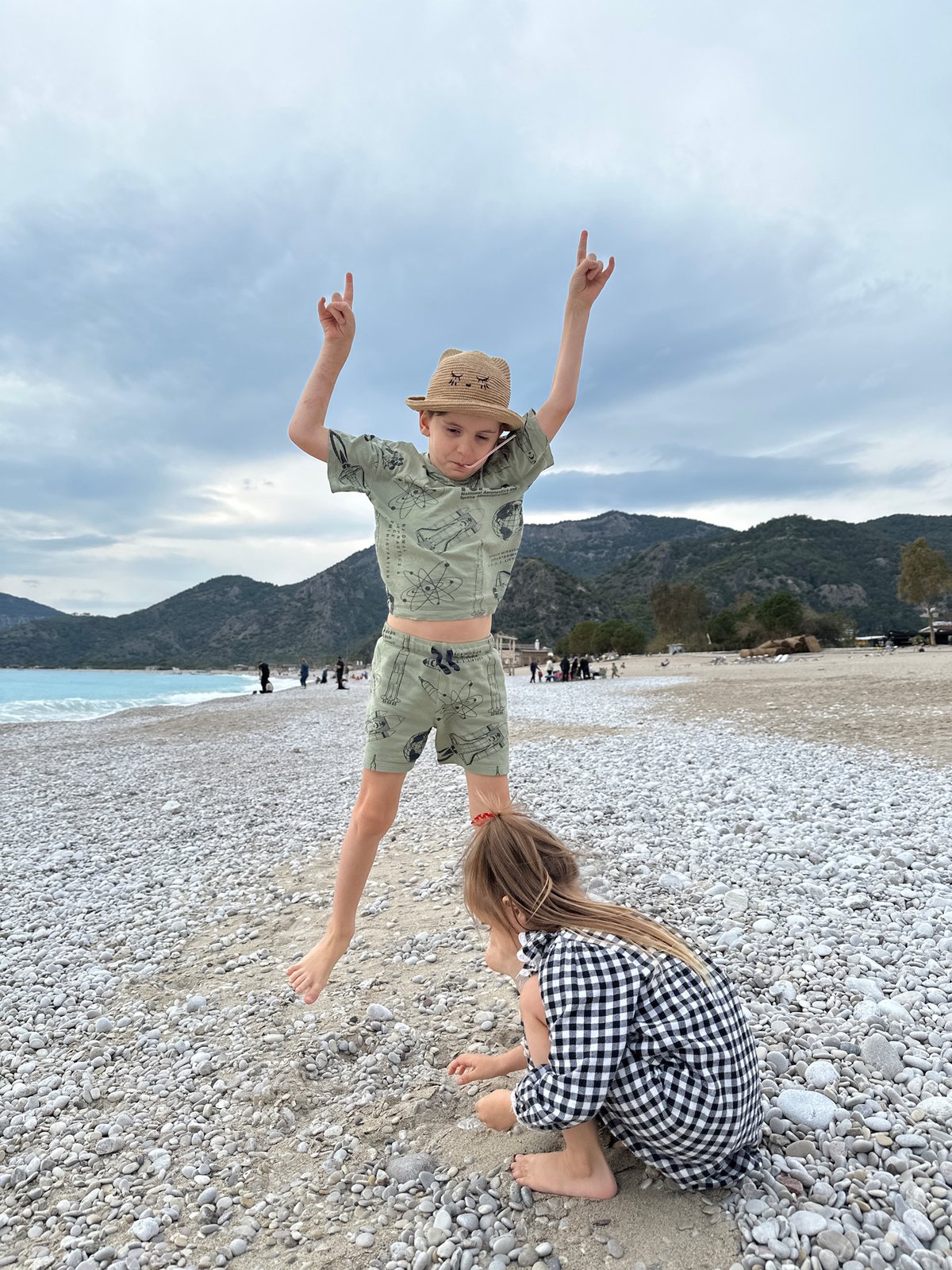 Family enjoys afternoon beach time in Fethiye, Turkey