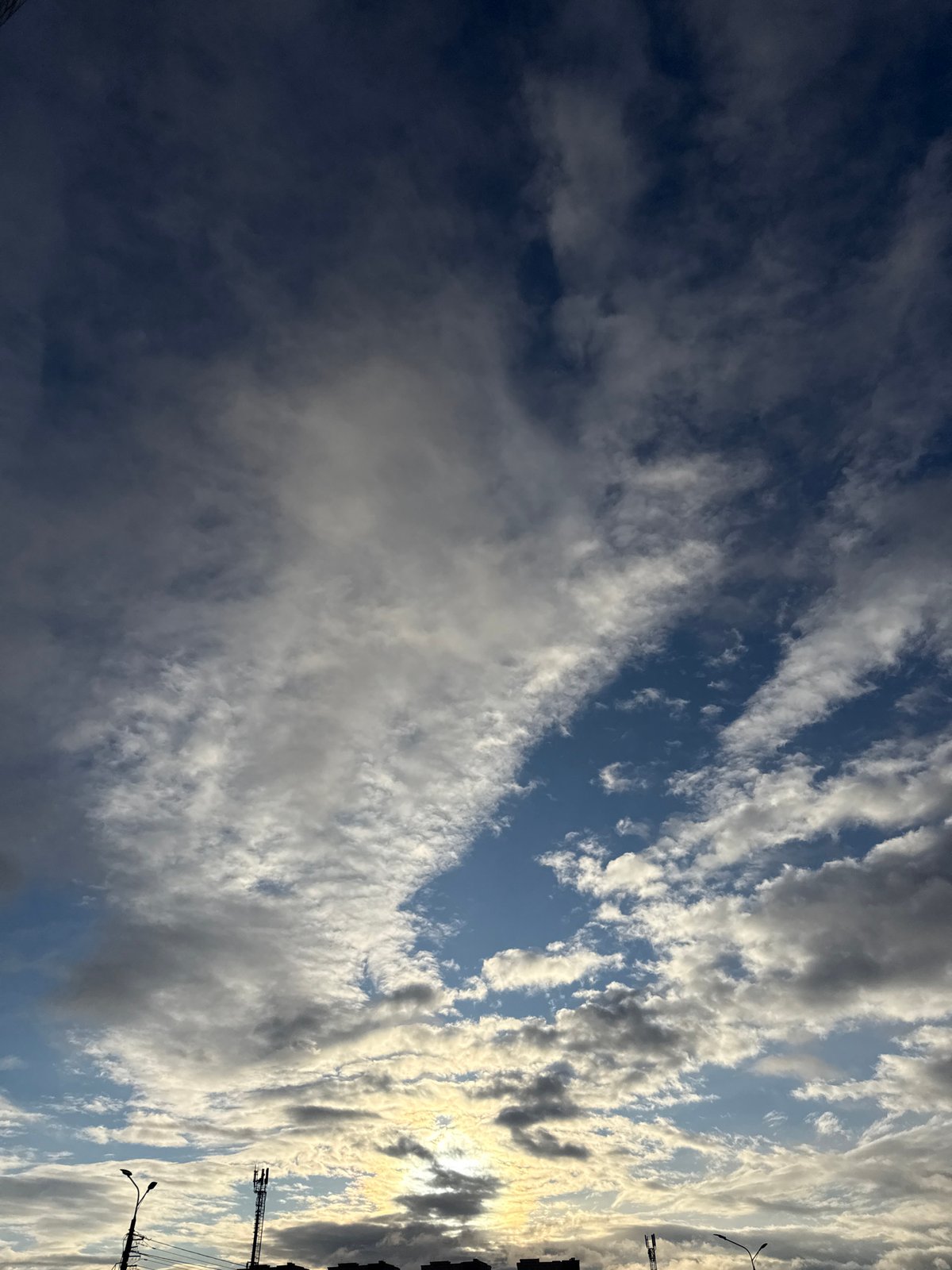 Krasnoyarsk resident documents dramatic skies, corgi during evening walk