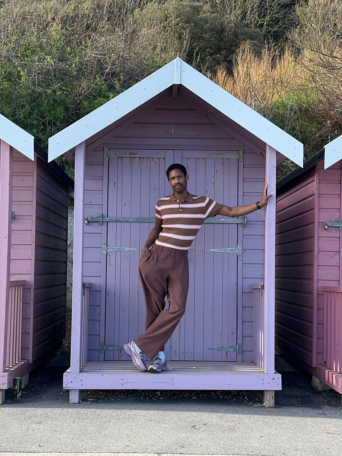 Person enjoys sunny day at Folkestone coast