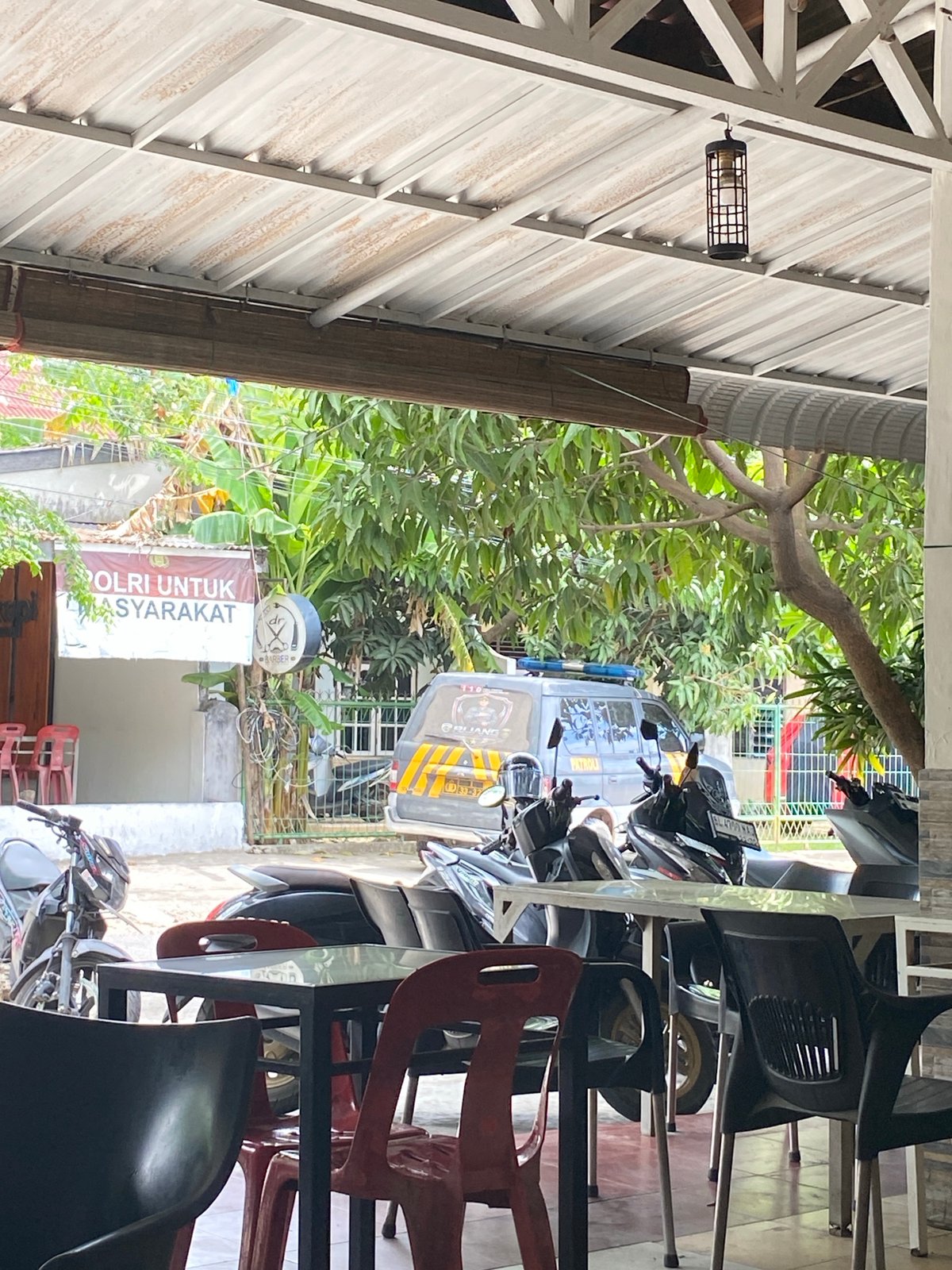 Morning café life documented in Lhokseumawe, Indonesia