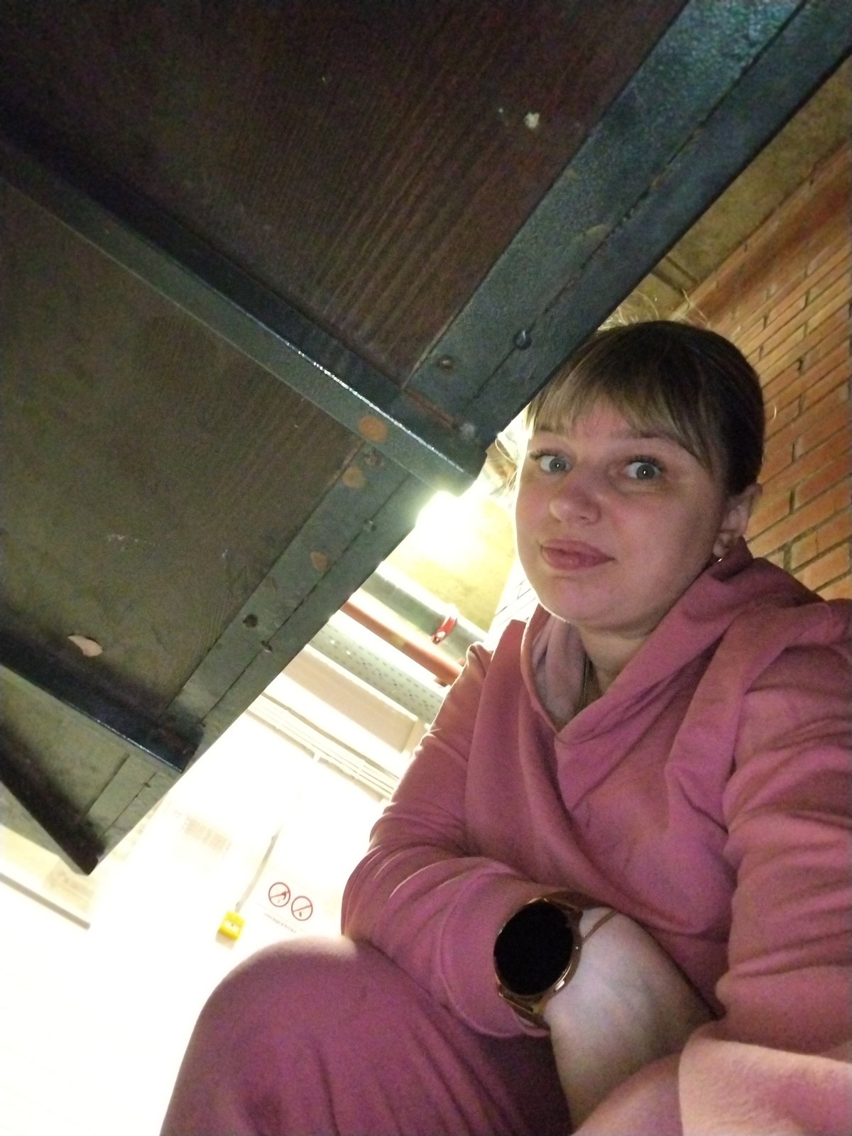 Woman photographed in indoor workspace setting in Шебунино, Russia