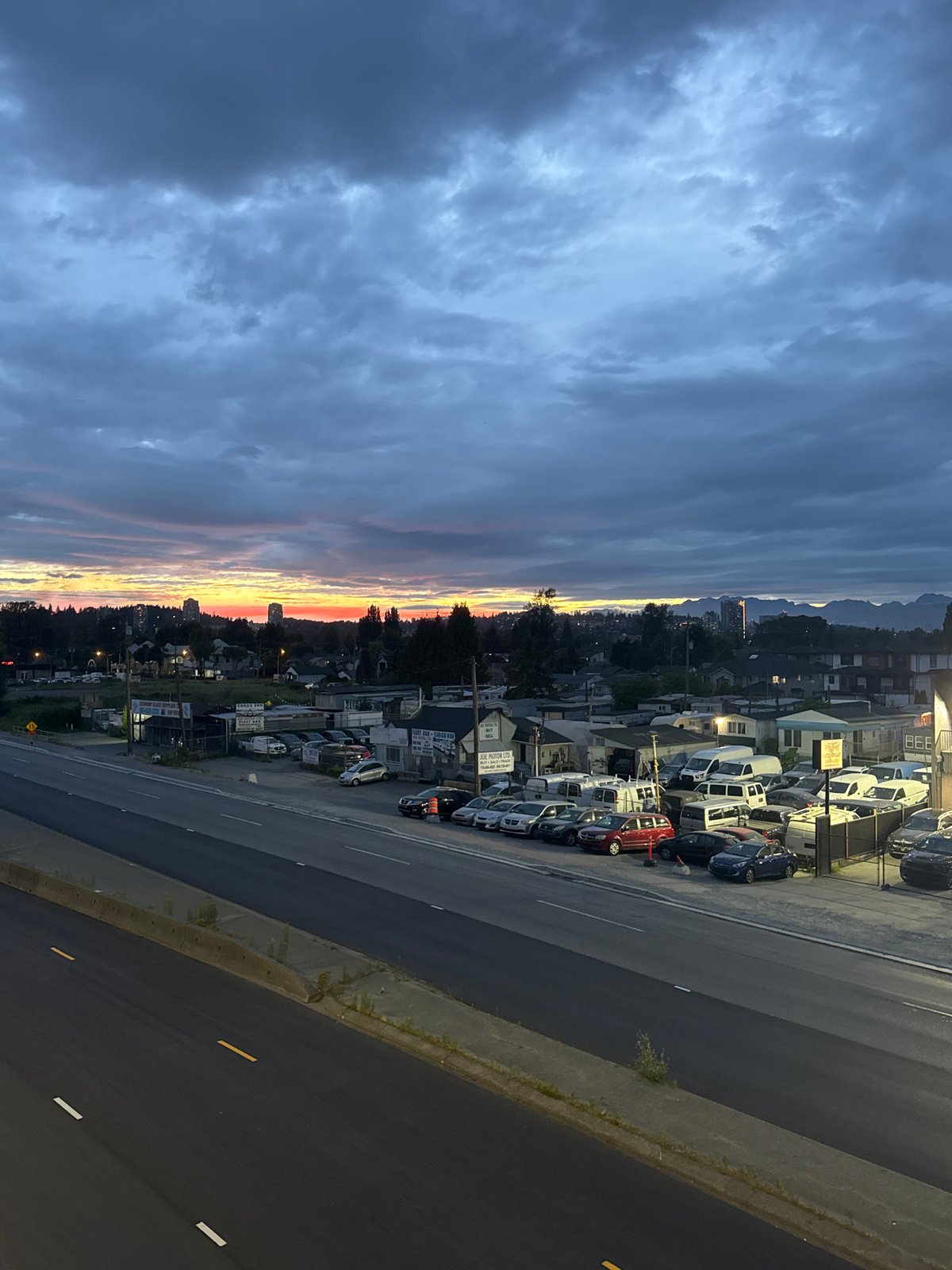 Surrey overpass at twilight, dramatic sky over the highway