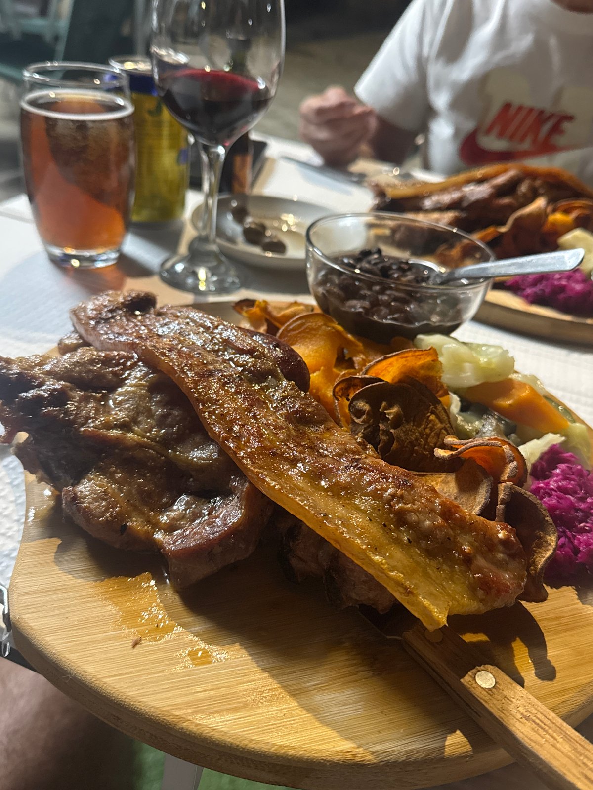 Cooked meat platter with accompaniments documented by witness