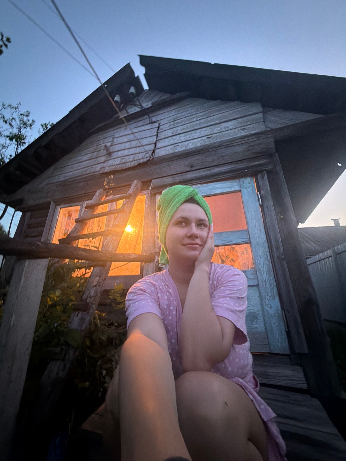 Evening porch scene in Krasny Mayak village, Russia