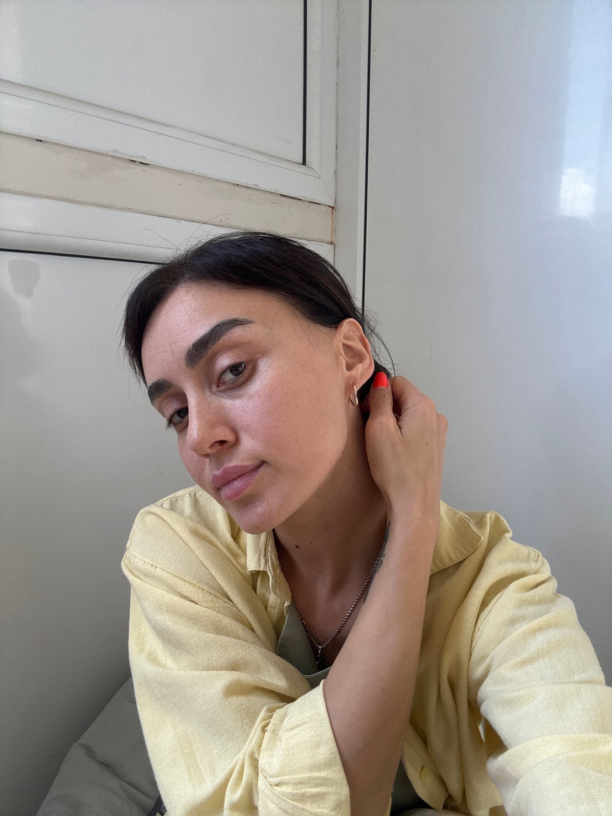 Casual morning at a Tbilisi workspace, selfies and sticky notes