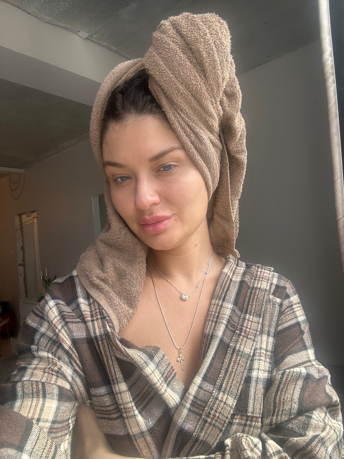 Woman in towel photographed with baby in Moscow area