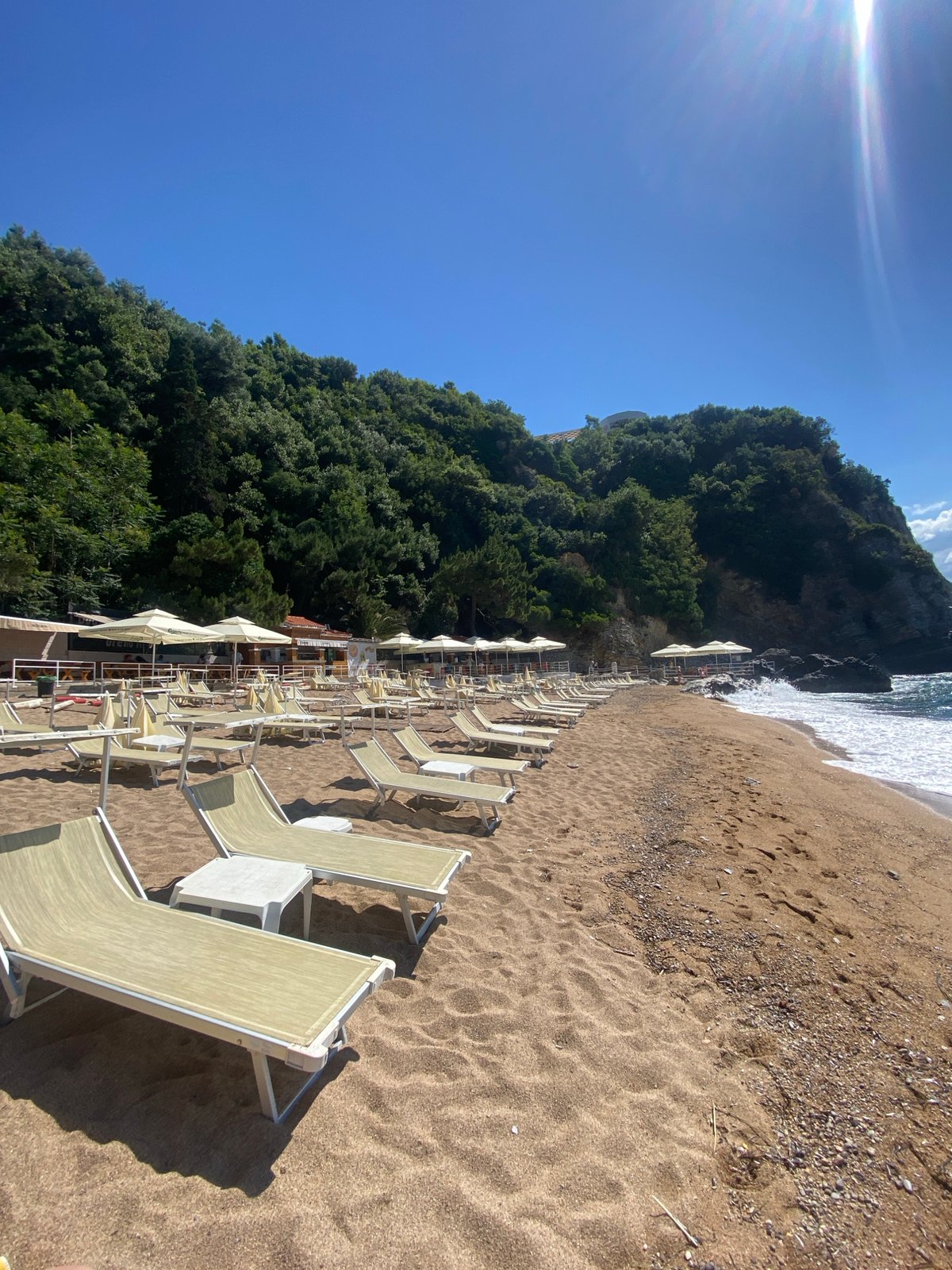 Morning motorcycle ride documented through sunny Budva streets