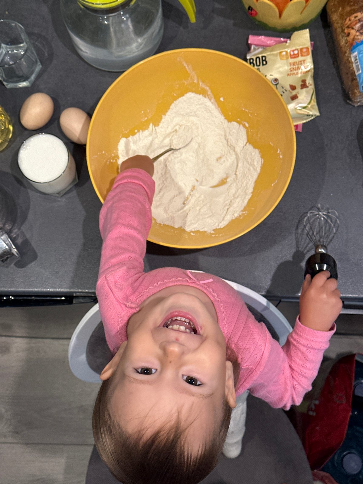 Child enjoys baking activity in Wisła, Poland
