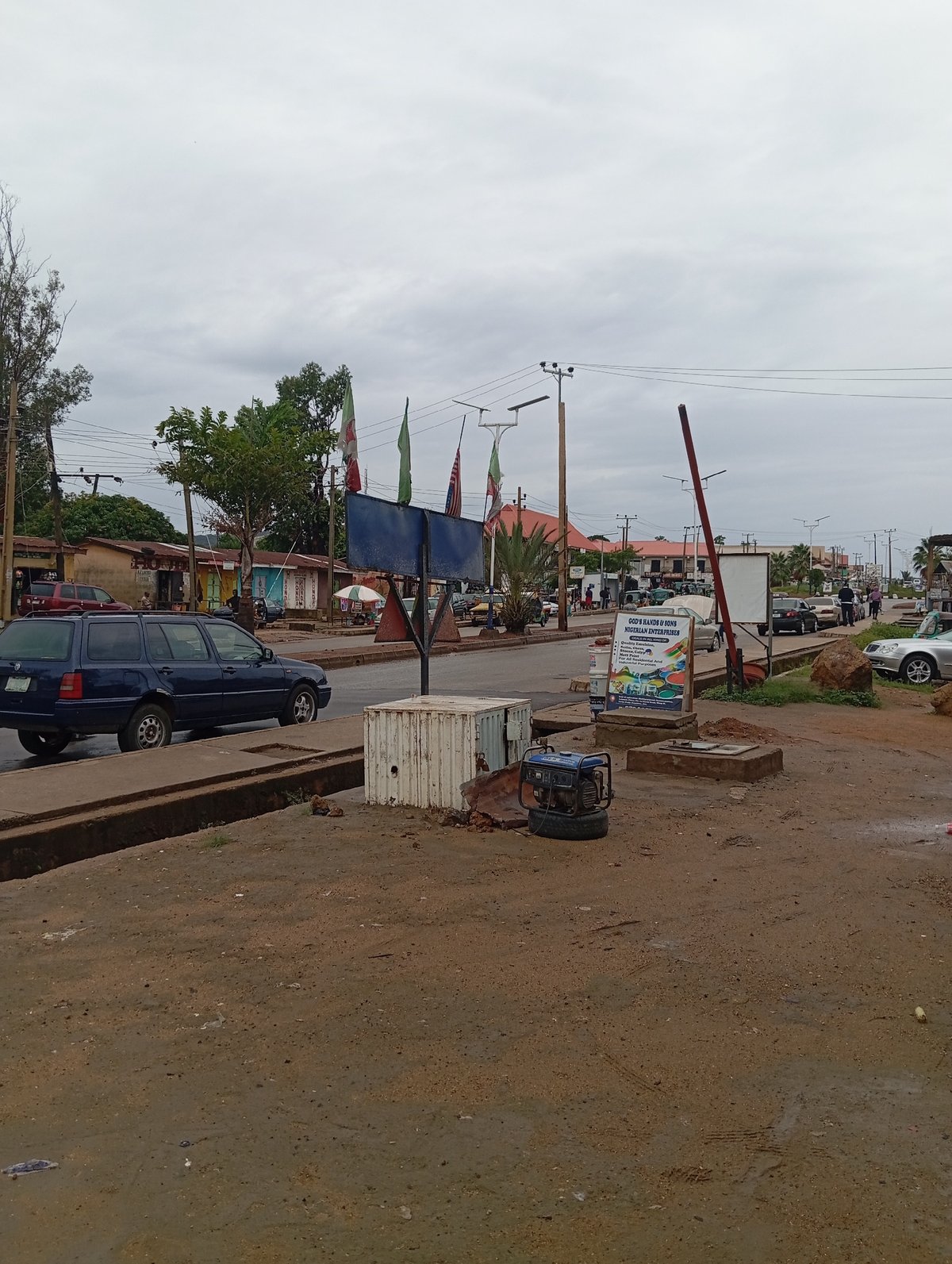 Urban street shows muddy conditions after rainfall