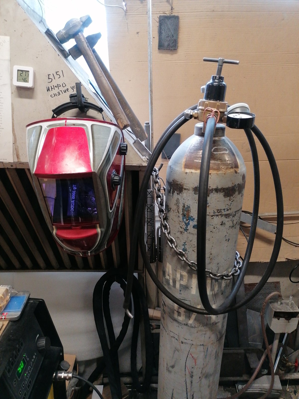 Workshop welding session documented with equipment and safety gear