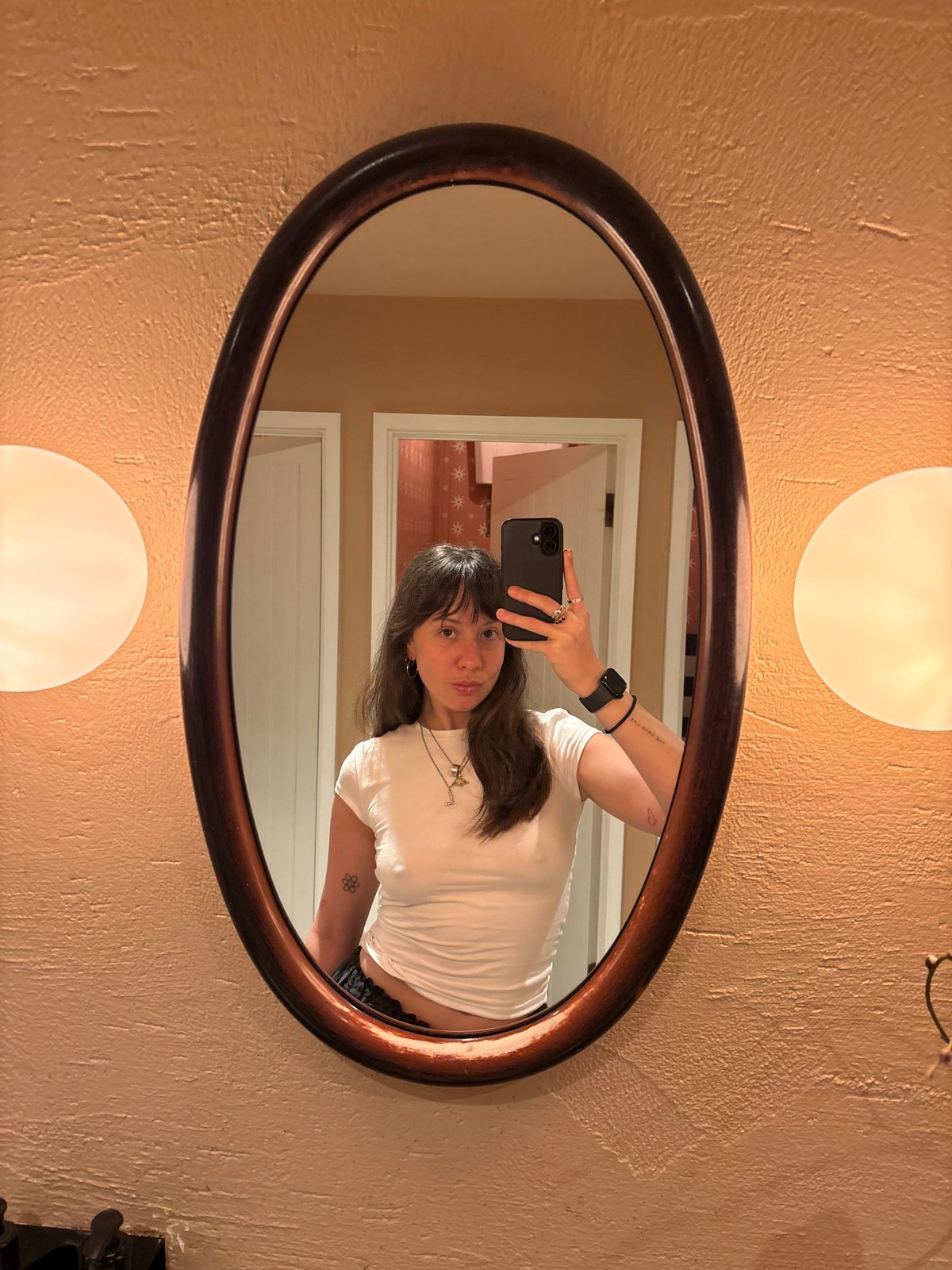 Woman takes mirror selfie in London